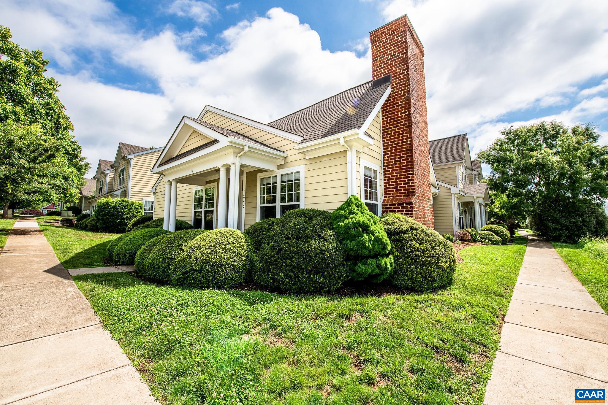 BRING ON THE OFFERS! Come tour this beautifully like-new villa offering the ease of one-level living. Every detail has been updated, from the luxury vinyl plank flooring, fresh paint, HVAC, appliances, tile bathrooms, blinds, and more—there’s not a stitch of carpet. The kitchen features granite countertops and a sunny breakfast room that opens to the patio, while a flexible bonus room off the living area can serve as a home office or third bedroom. All appliances convey, including the washer and dryer. Located in the vibrant Wayland Grant community with over 100 homes, a playground, large soccer field, and scenic walking paths—all just ¾ of a mile from downtown Crozet.