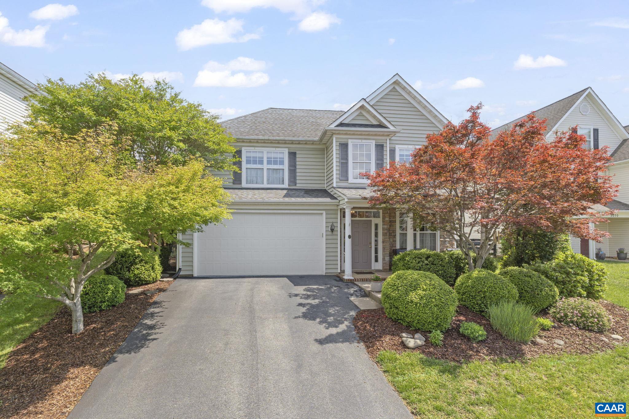 PRICE REDUCED! Charming and updated 4 bedroom, 2.5 bath home in Crozet's popular and convenient Highlands neighborhood. Just minutes to Crozet and to Western Albemarle schools, and an easy 15 minutes to Charlottesville and all things UVA! Neighborhood CONNECT bus stop goes to UVA and downtown! Surrounded by mature landscaping, stunning maples, and Blue Ridge Mountain views, and situated on a quiet cul-de-sac, this move-in ready home presents affordable, low maintenance living at its best. A bright open floor plan with the kitchen, family room w/fireplace, and patio being a wonderful spot for family togetherness and friend entertaining. The lovingly kept home features main level hardwood flooring, granite kitchen with newer stainless appliances and island, butler's pantry, and soaring two story foyer. Spacious primary bedroom with walk-in closet and tiled bath. 2 of the 3 additional bedrooms boast walk-in closets. Handy upstairs laundry room. 168sqft third level perfect for small gym, reading nook, meditation space. Wonderfully shaded front porch is perfect for late afternoon relaxing, as is the large rear patio. Attached two car garage has plenty of room for cars  & storage. Community yard maintenance and trash pickup.
