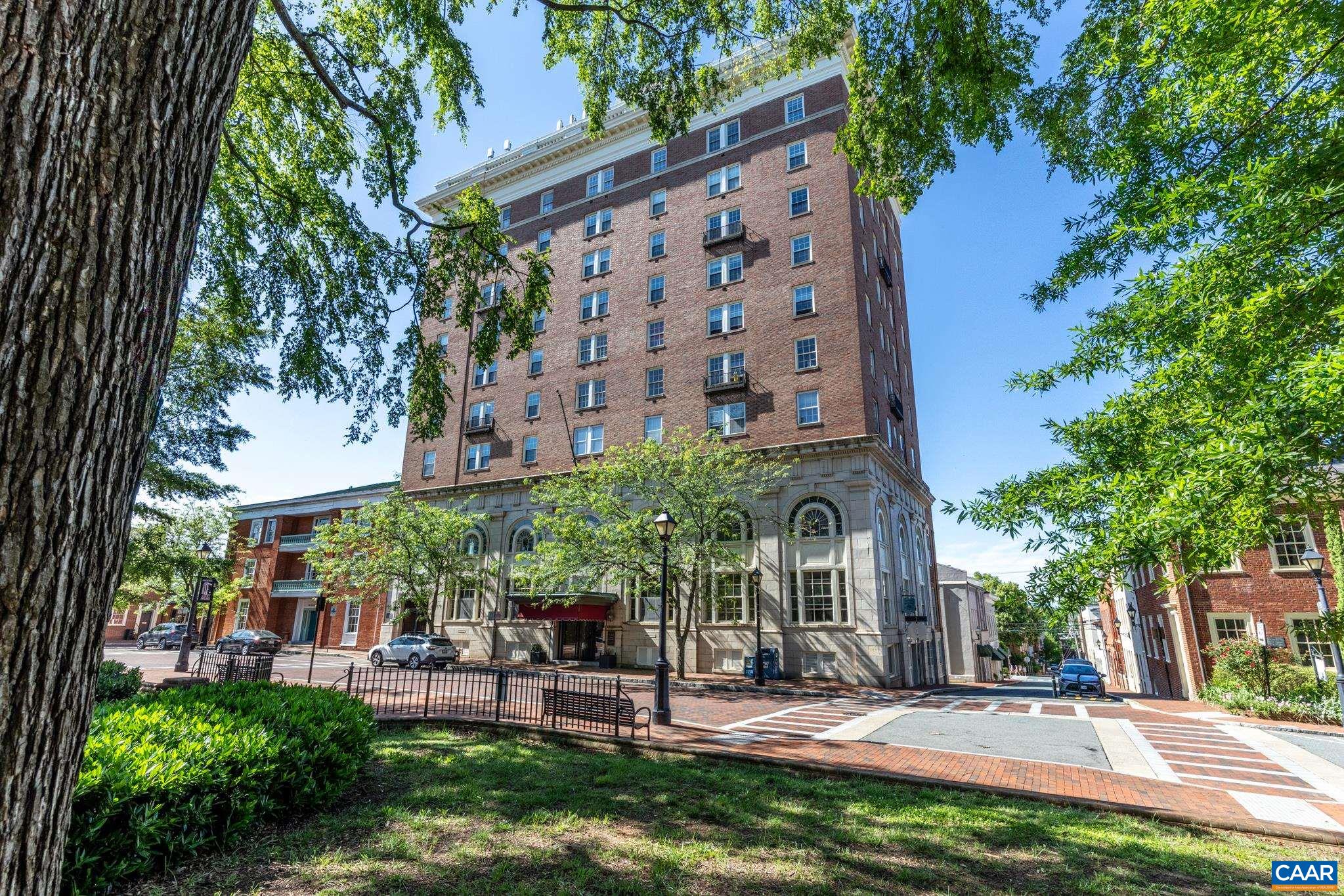 This exceptional residence, originally 2 distinct units within the former historic Monticello Hotel, presents a superb opportunity for either a discerning private resident or as a strategic investment. 2021, these units underwent a comprehensive, architecturally designed renovation, encompassing significant upgrades including  new windows, plumbing, & hot water heater. 1252 sq feet on the 5th floor, this beautifully transformed, upscale abode seamlessly blends historic charm with contemporary luxury. Each room is bathed in abundant natural light, offering sweeping urban vistas & picturesque mountain views. The newly designed, spacious kitchen is a culinary enthusiast's dream, featuring elegant white cabinetry, exquisite Bianco Calacatta Silestone countertops, & state-of-the-art stainless-steel appliances. From the kitchen and dining area, one can enjoy a captivating view of the historic Courthouse. A convenient private laundry area. Every update & renovation has been executed with meticulous attention to detail by a dedicated architect and construction team. Residents benefit from elevator access & full x concierge. Offers will be considered!