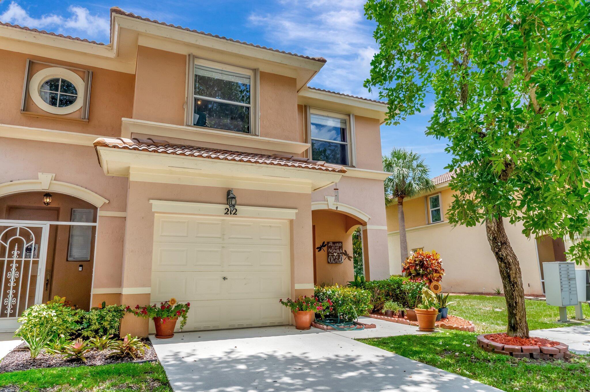 Welcome to this beautifully updated and freshly painted 3-bedroom, 2.5-bathroom end-unit townhome, located in the well-located gated community of Seminole Estates in Royal Palm Beach.Spanning 1,579 square feet, this spacious home offers a perfect blend of modern comfort and stylish upgrades. At the heart of the home is a fully renovated kitchen featuring elegant custom 42-inch upper cabinets that provide generous storage and a sleek, contemporary aesthetic.  The main level showcases brand-new wood-look tile flooring--combining durability with style--while fresh interior paint and a freshly painted exterior create a bright, welcoming atmosphere inside and out. All bathrooms have been thoughtfully updated with modern fixtures and high-end finishes, ensuring a cohesive and luxurious feel. While the open-concept floor plan creates a seamless flow between the living, dining, and kitchen areas it's perfect for both entertaining and everyday living.
As a corner end  unit, this townhome offers added privacy and an abundance of natural light. Step outside to enjoy a spacious, covered, and screened-in patio that overlooks a serene greenbelt area, ideal for relaxing. The property also includes a one-car garage, providing secure parking and extra storage space.
Seminole Estates is a secure, gated community that offers residents access to a range of amenities, including  access to 2 sparkling swimming pools and a designated play area for children. The community is well-maintained with low monthly HOA fees, allowing you to enjoy the benefits of community living without the high costs.

Ideally situated in the heart of Royal Palm Beach, this home provides convenient access to an array of local attractions. Nearby dining options include Bella Cucina, Jamal's Mediterranean Food, First Watch, Outback Steak House  La Cantinita, and PapiChulo Tacos. Shopping is just minutes away at The Mall at Wellington Green, offering a wide variety of retail stores and eateries. For outdoor enthusiasts, Royal Palm Beach Commons features a 17,000 square foot sporting center, canoe and kayak facilities, and a casual dining area. The neighboring village of Wellington, known for its vibrant equestrian community, offers additional attractions such as the National Polo Center and the Wellington Environmental Preserve.
Close proximity to well-regarded schools, including Everglades Elementary School, Crestwood Community Middle School, and Royal Palm Beach High School.
This beautifully upgraded townhome is a rare find in a sought-after community offering comfort, style, and an unbeatable location. Schedule your private tour today and experience the best of Royal Palm Beach living.