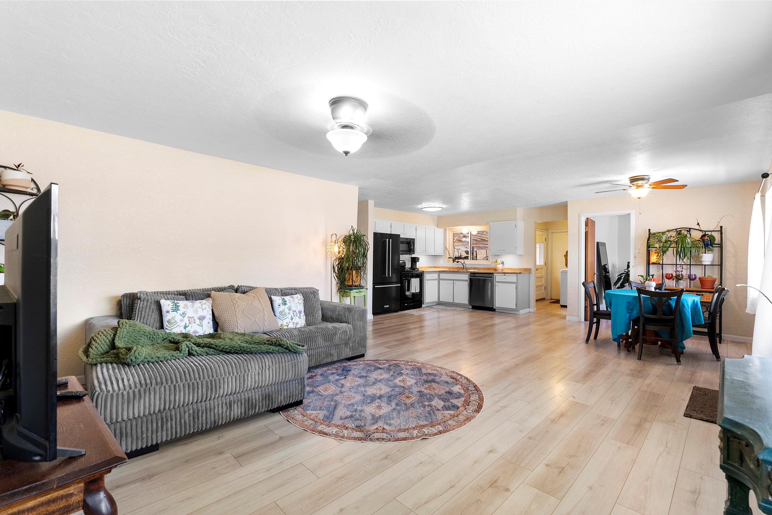 Open House Sunday 8/24 2-4pm. Charming 3BR/2BA Snow Heights home with stunning mountain views from the living and dining rooms. Thoughtfully updated in 2020 with refrigerated A/C, new heater, stucco, subflooring, flooring, and an opened-up kitchen for a more modern flow. Enjoy spacious front and back yards, plus a covered patio perfect for entertaining or unwinding with a morning coffee or evening drink. The area is also equipped with electric service for a hot tub set up! This well-maintained home blends comfort and convenience--bring your buyers to experience its warmth and views in person!