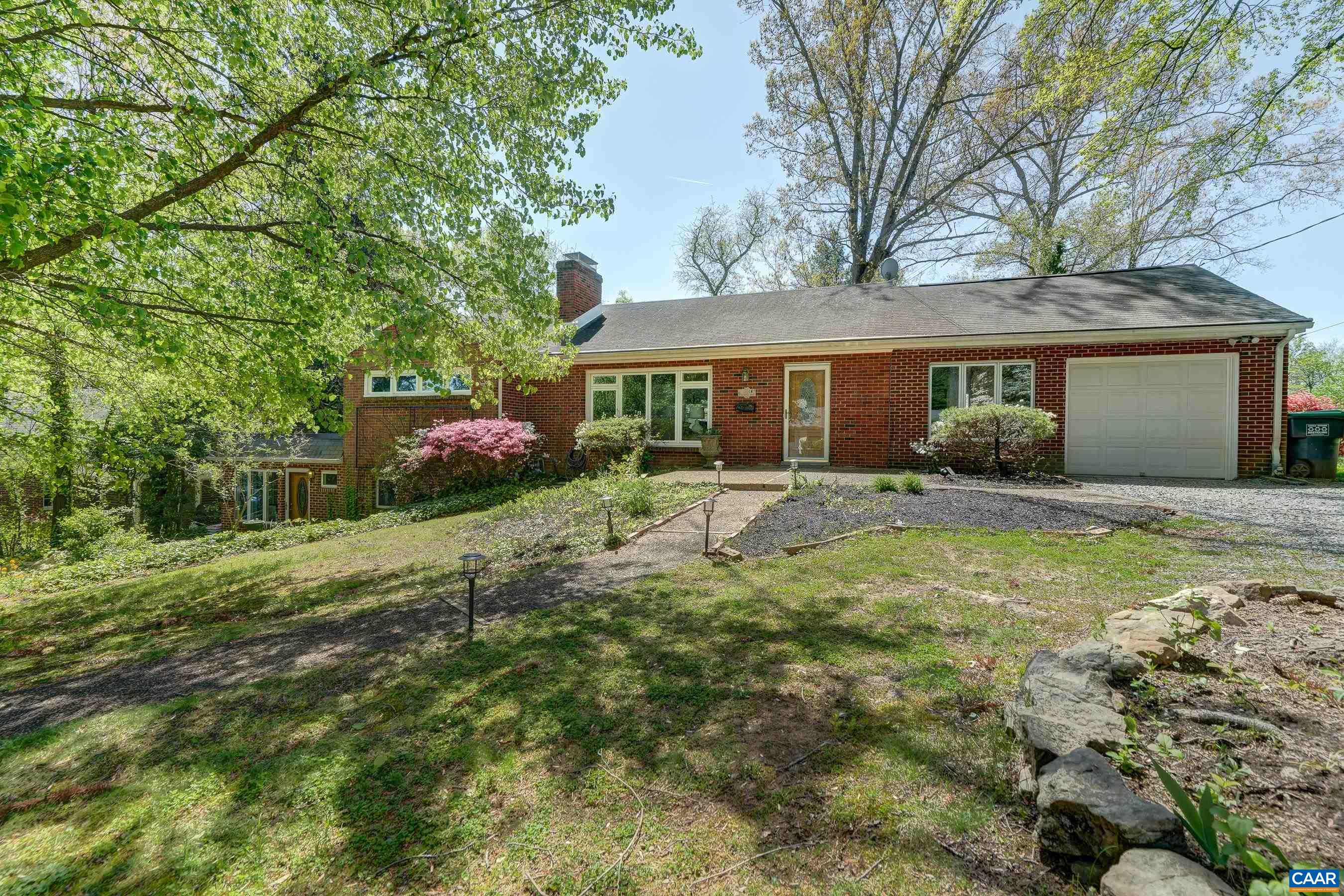 Great value with lots of possibilities!  Wonderful brick ranch home with main level living and potential income-generating basement apartment. Walk to Marie Bette, Dairy Market and more! Spacious fenced rear yard on quiet street in the desirable heart of Charlottesviile, Rugby area. Walk to McIntire Park, downtown restaurants and shopping and the Rivanna Trail.  Main level features hardwood floors, living room with brick fireplace, dining room and three bedrooms. Finished lower level features a flex room with full bathroom, laundry and multiple storage rooms. Basement features a large open dining/living space with eat-in kitchen and carpeted bedroom with full bathroom. Currently being rented as two different units. Unit A rents for $2200/mo and lease ends 11/30. Unit B rents for $1500/mo and lease ends 11/30.Purchaser agrees to participate in a 1031 Exchange at no expense to purchaser.