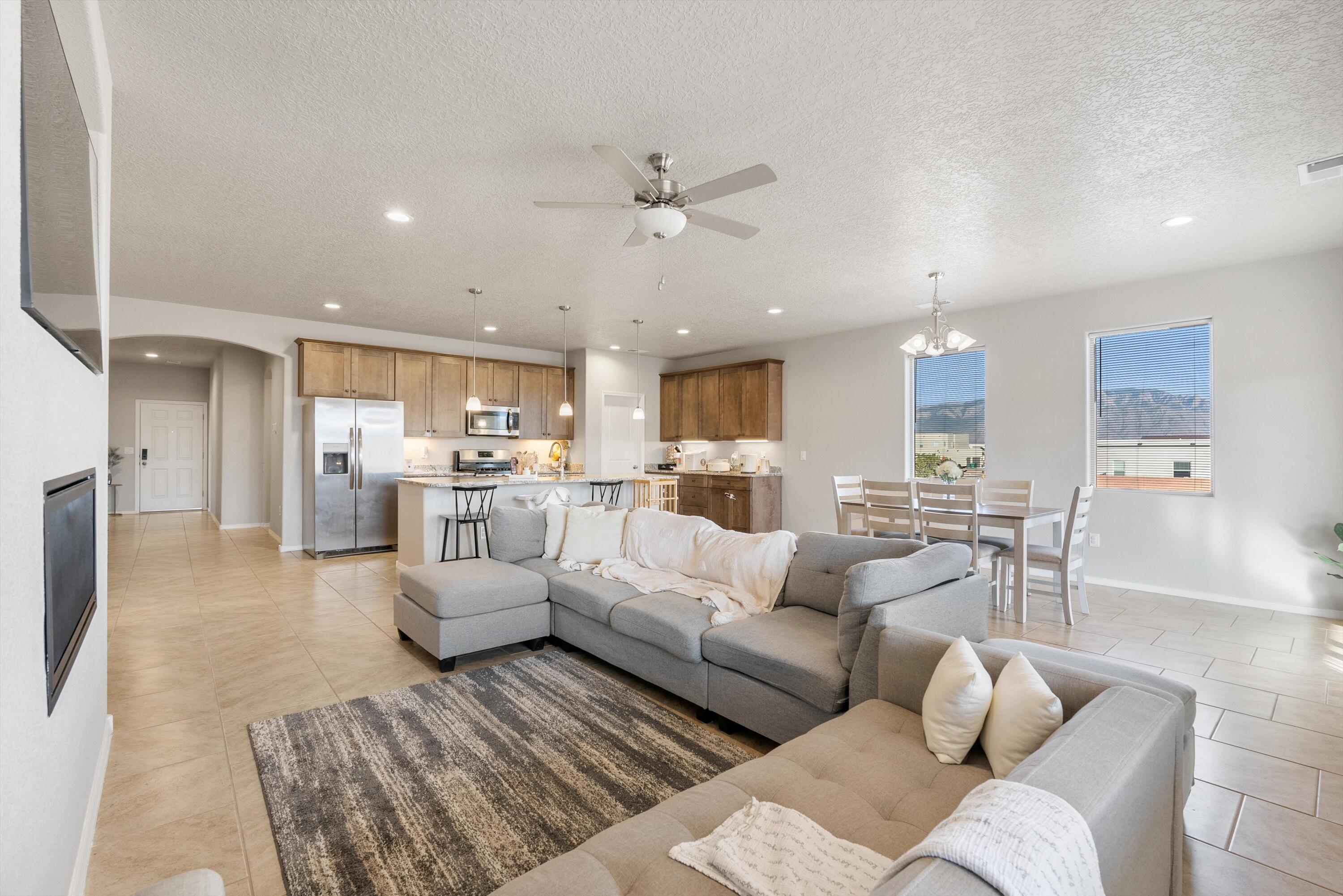 OPEN HOUSE Saturday the 16th from 9-2! Welcome to your dream home! Built in 2023 and thoughtfully upgraded for modern living. This 4-bedroom gem features an open, airy floorplan that makes entertaining a breeze. The spacious living room flows seamlessly into the kitchen and dining area, perfect for hosting everything from cozy game nights to lively dinner parties.The three-car garage offers versatility galore~use it for extra parking, a workshop or a home gym, like the current owners! Every detail in this home has been carefully chosen for comfort, function, and style. Whether you're relaxing in the generous living space or enjoying quiet mornings with coffee in hand, this home invites you to slow down, settle in, and truly live.