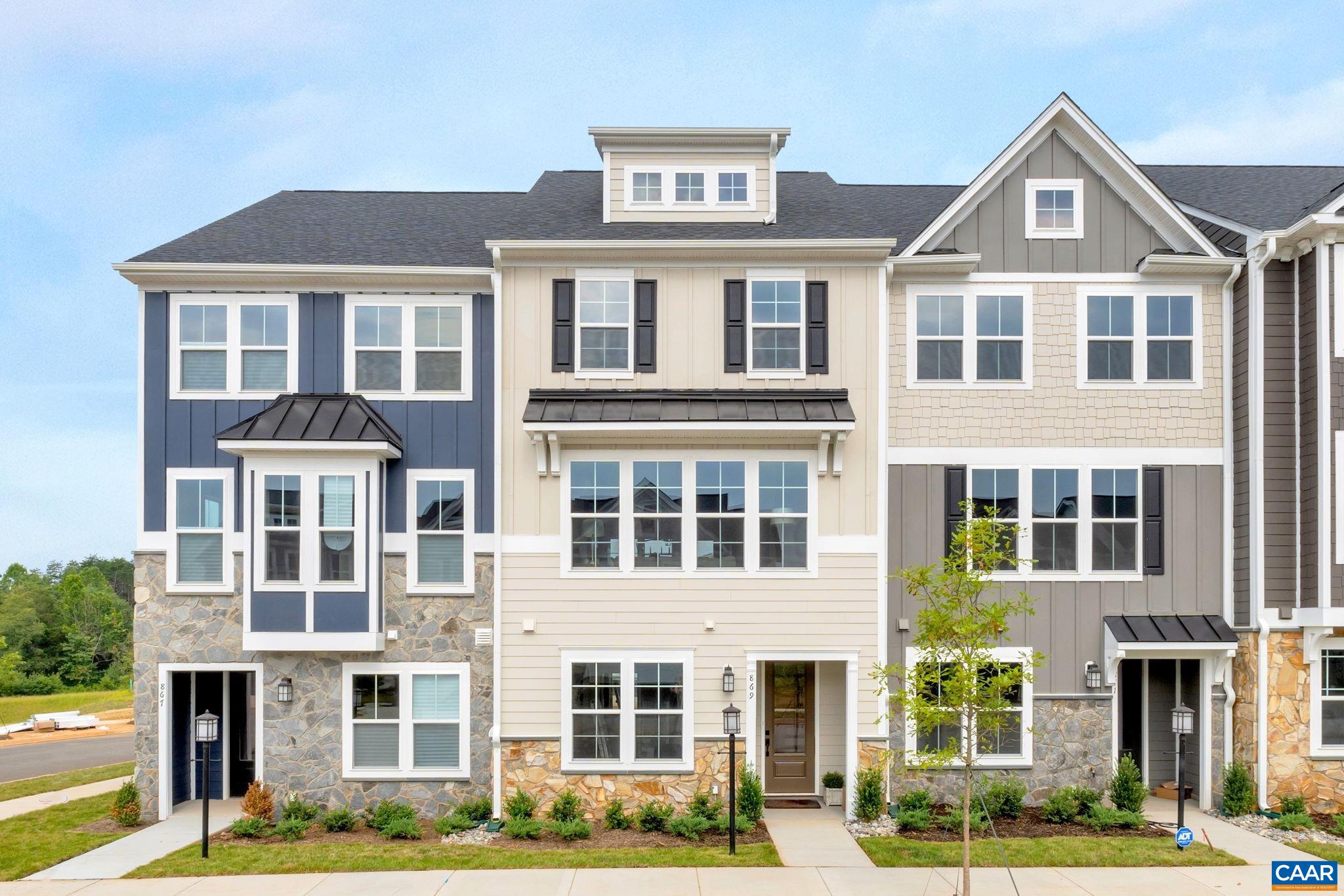 Introducing the Holly II, a three-story townhome coming to the newest phase of Belvedere, with completion expected in Fall 2025. This layout offers flexibility and space, starting with a first-floor bedroom and full bath that could work well as a guest room, home office, or extra hangout area. The main level includes a roomy kitchen with a walk-in pantry, open dining space, and a bright family room, along with a convenient half bath. Upstairs, you’ll find the primary suite with its own private bath, two additional bedrooms, a shared hall bath, and laundry nearby for easy access. Features like oak stairs with open railings and gas appliances add a clean, finished feel. A two-car garage sits at the back of the home, providing both parking and additional storage.  Belvedere offers an array of amenities, including access to parks, close proximity to the Rivanna trailhead, the nearby SOCA Fieldhouse, a dedicated dog park for pet owners, and enchanting playground areas.  Photos are of similar home and may show optional upgrades.