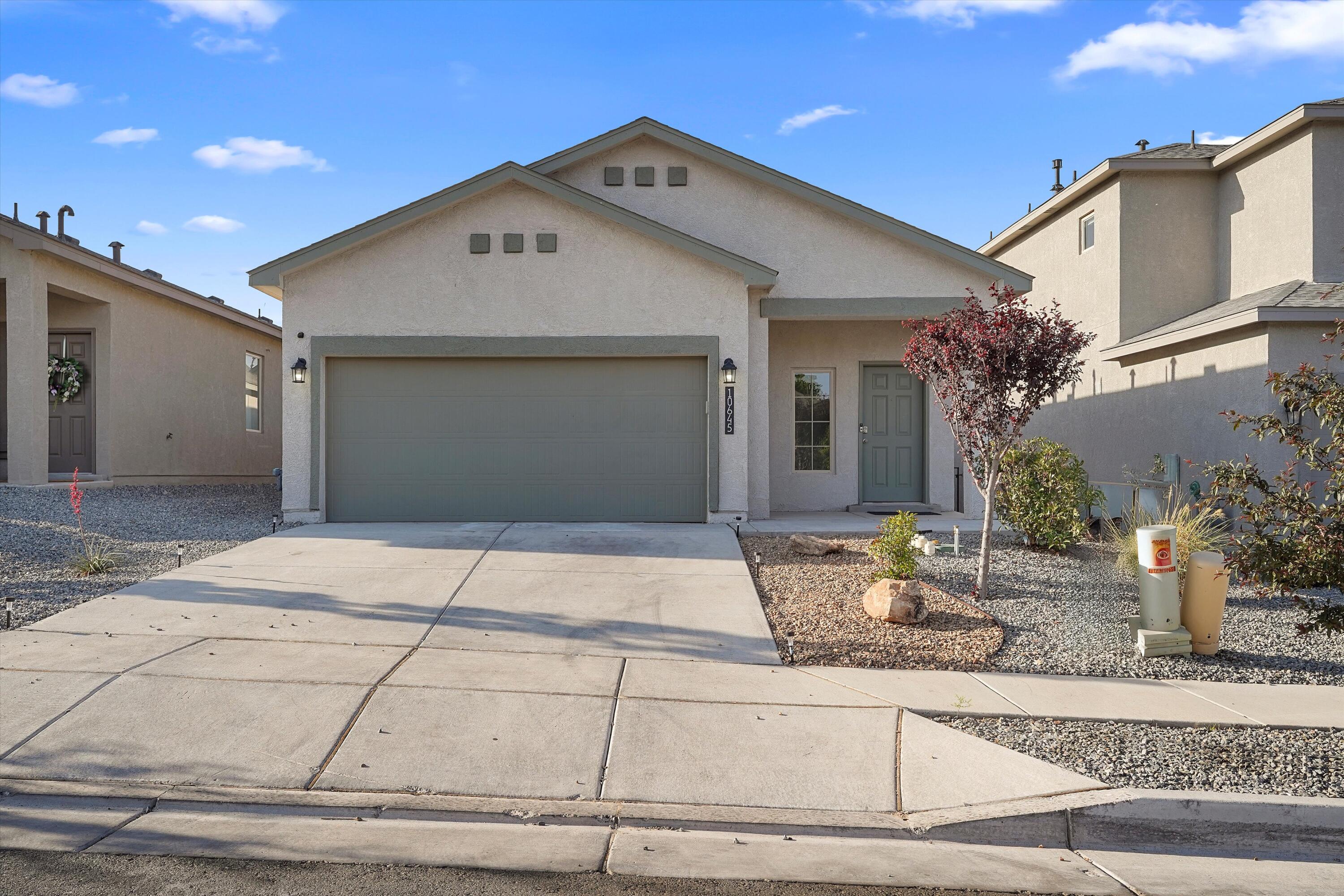 Welcome to 10645 Caresso Loop SW--an impeccably maintained 3-bedroom, 2-bath home with 1,519 sq ft of thoughtfully designed living space. Enjoy an open great room filled with natural light, stylish tile in all wet areas, neutral paint, and upgraded finishes throughout. The kitchen is a chef's dream with quartz countertops, subway tile backsplash, stainless steel appliances, and a large island. Retreat to the oversized shower in the primary suite or relax on the covered patio overlooking a beautifully landscaped yard with turf, lava rock, and flagstone walkways. Located in a gated community with parks and trails. Low utilities and a $60 yearly HOA complete this stunning offering.3.9% VA assumable interest rate on the CORRAL loop listing