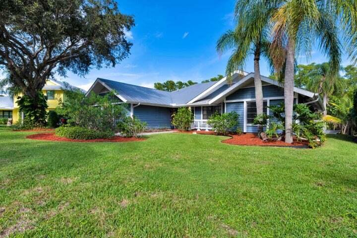 Welcome to your serene sanctuary! This well-maintained residence is a true gem, nestled against a lush preserve on the Intracoastal Waterway, you'll love the peaceful ambiance of the private backyard and expansive screened patio - imagine listening to the waves crash as you relax! The interior features a  split floor plan, spacious living room with vaulted ceilings and a kitchen complete with a bright and airy eating or sitting area. With the beach a short drive, bike ride or even jog away, this home is an ideal retreat for those seeking the best of coastal living.  Hobe Sound is a quaint beach town about 10 minutes north of Jupiter and 10 minutes south of Stuart with additional shopping, dining and entertainment options in either direction.