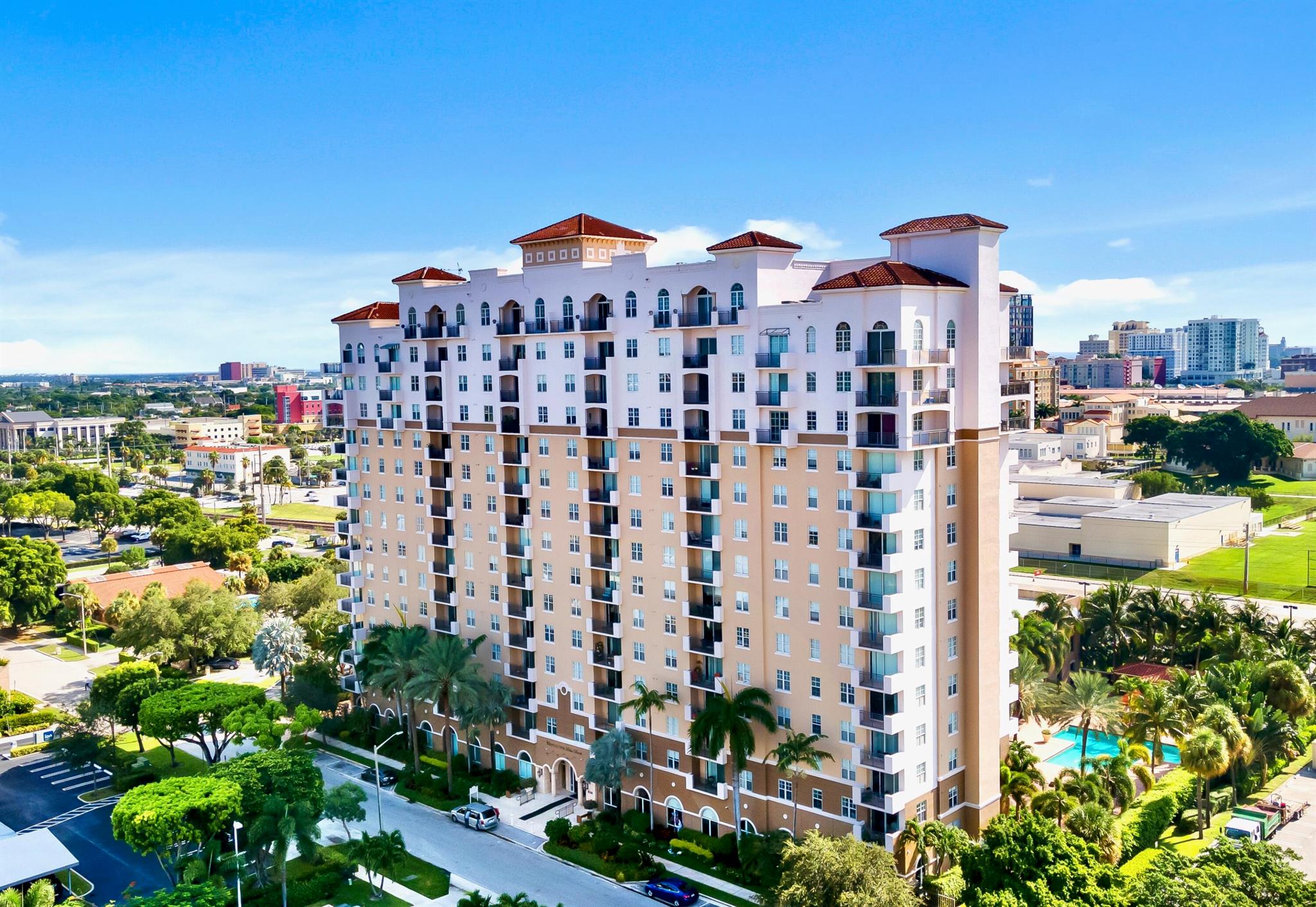 Rarely available and highly desirable southeast-facing, 2bedroom en suite corner unit with unobstructed city and pool views in the charming Montecito. Perfect for full-time residents, snowbirds and investors (can rent immediately). AC and WM 2023. New carpet and paint 2022. Exceptional location: Easy access to I-95, CityPlace shops and restaurants, Kravis Center, Palm Beach island, and PBI airport. Garage parking for 2 cars, EV charge stations, fiber optic internet, 24-hr concierge, and impressive amenities including updated fitness center, social lounge, summer kitchen and grill, and new fire pit by the pool. Owners may own 2 pets up to 30lbs/ea. Seller to pay special assessment in full at closing. Come see!