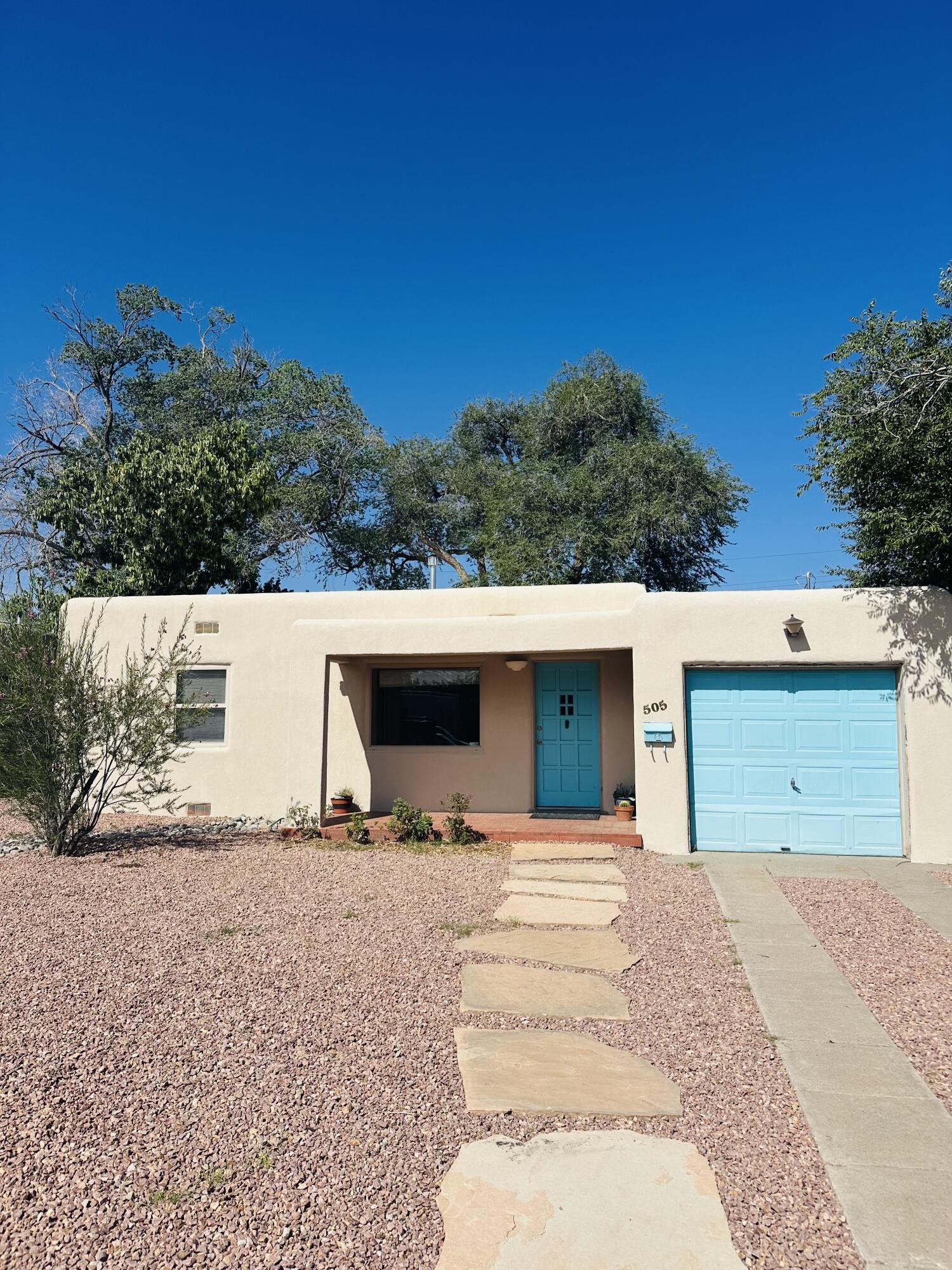 Nestled in Albuquerque's charming Parkland Hills neighborhood, this single-family home blends vintage appeal with distinctive mid-century architecture and thoughtful updates throughout. The open floor plan features a stunning addition with soaring 11-foot ceilings in the great room and 9-foot ceilings in the bedroom, creating a spacious and airy atmosphere with lots of light. The master bedroom offers a full walk in closet, separate tub and shower. As well as recent upgrades that include new stucco, newer roof, water heater, and fully landscaped front and back yards. Located just a short walk from local parks and the vibrant Nob Hill district to coffee shops, restaurants, hospitals, and the university. This home offers the perfect mix of historic charm and contemporary convenience.