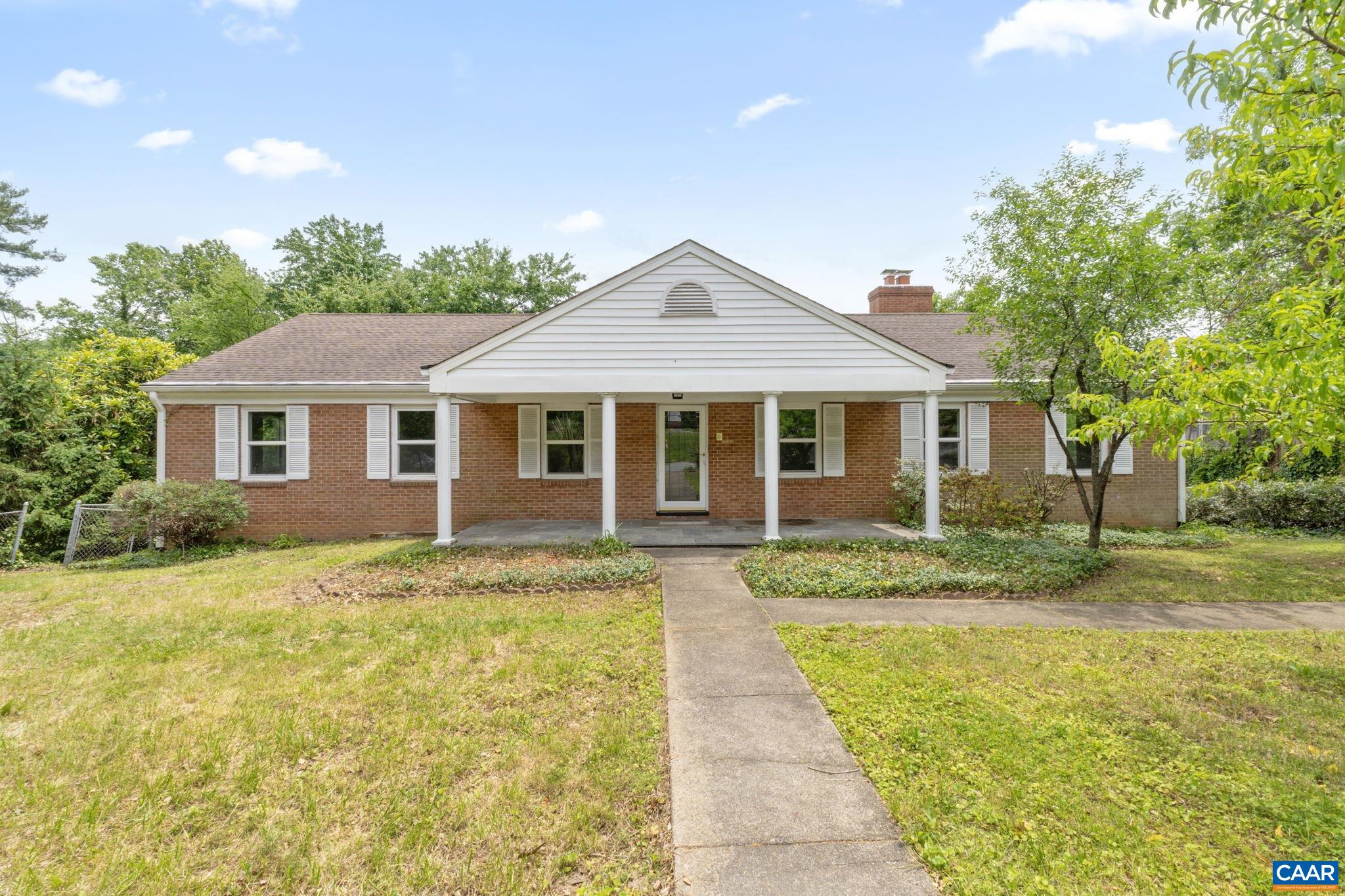 OPEN HOUSE Sunday 7/20 12-2 PM Exceptional value per square foot! This classic 4BR/3BA brick home with elegant white columns offers an exceptional opportunity to live close to UVA, Barracks Road Shopping Center, and Darden School. Situated on a generous lot with cherry and apple trees, the property also features a pool, creating a serene backyard oasis.  Inside, you’ll find spacious rooms filled with natural light, including a separate dining room and a primary bedroom with an ensuite bath.  Enjoy 2 fireplaces, hardwood floors, and a basement with additional space to tailor to your needs.  Prime location and timeless architecture make it a rare find in this sought-after neighborhood.