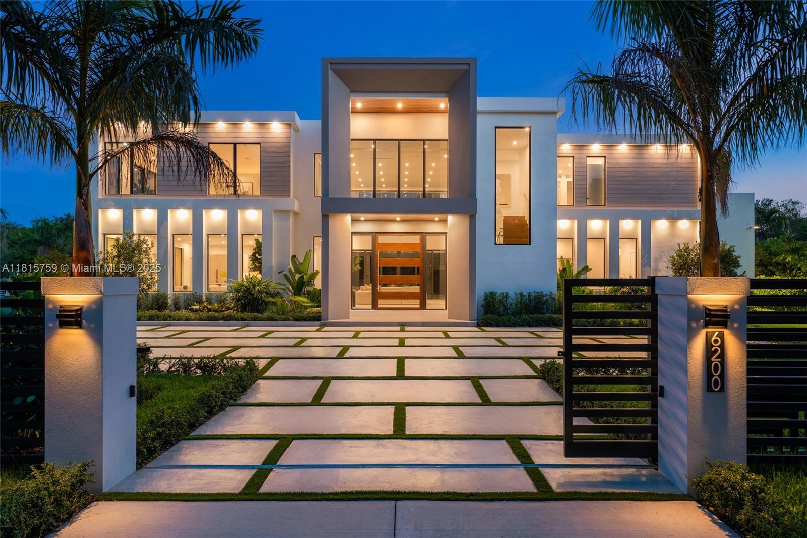 Discover this stunning new 2025-built estate in Pinecrest, where elegance meets modern design. Behind the private gates, this impressive home features 6 bedrooms, 6.5 bathrooms, and a spacious 3-car garage. At its center is a gourmet kitchen equipped with premium Sub-Zero and Wolf appliances, designed for both functionality and style. Upstairs, the primary suite offers breathtaking views of the lush backyard, while the spa-inspired bathroom boasts marble walls, a soaking tub, and a luxurious shower, creating a tranquil retreat. The outdoor space is equally captivating, featuring a sparkling pool, built-in barbecue, and beautiful Sylvester Palms—perfect for both relaxation and entertaining.