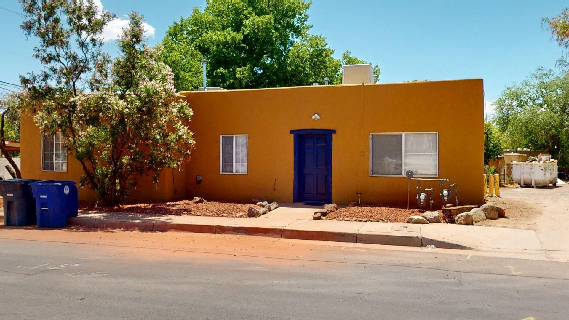 Excellent income-producing 4plex in Albuquerque's vibrant and walkable Barelas neighborhood! This unique property includes a well-kept triplex plus a detached casita, each unit offering off-street parking and private yard space. One unit fully renovated in 2025 with modern finishes and new mini-splits and available for showings. Located just steps from the zoo, parks, and the Barelas Community Center with its free amenities. Units are under-rented, providing immediate value-add potential. Ideal for owner-occupants--live in one unit and let the other three pay the mortgage with low-down financing options available.