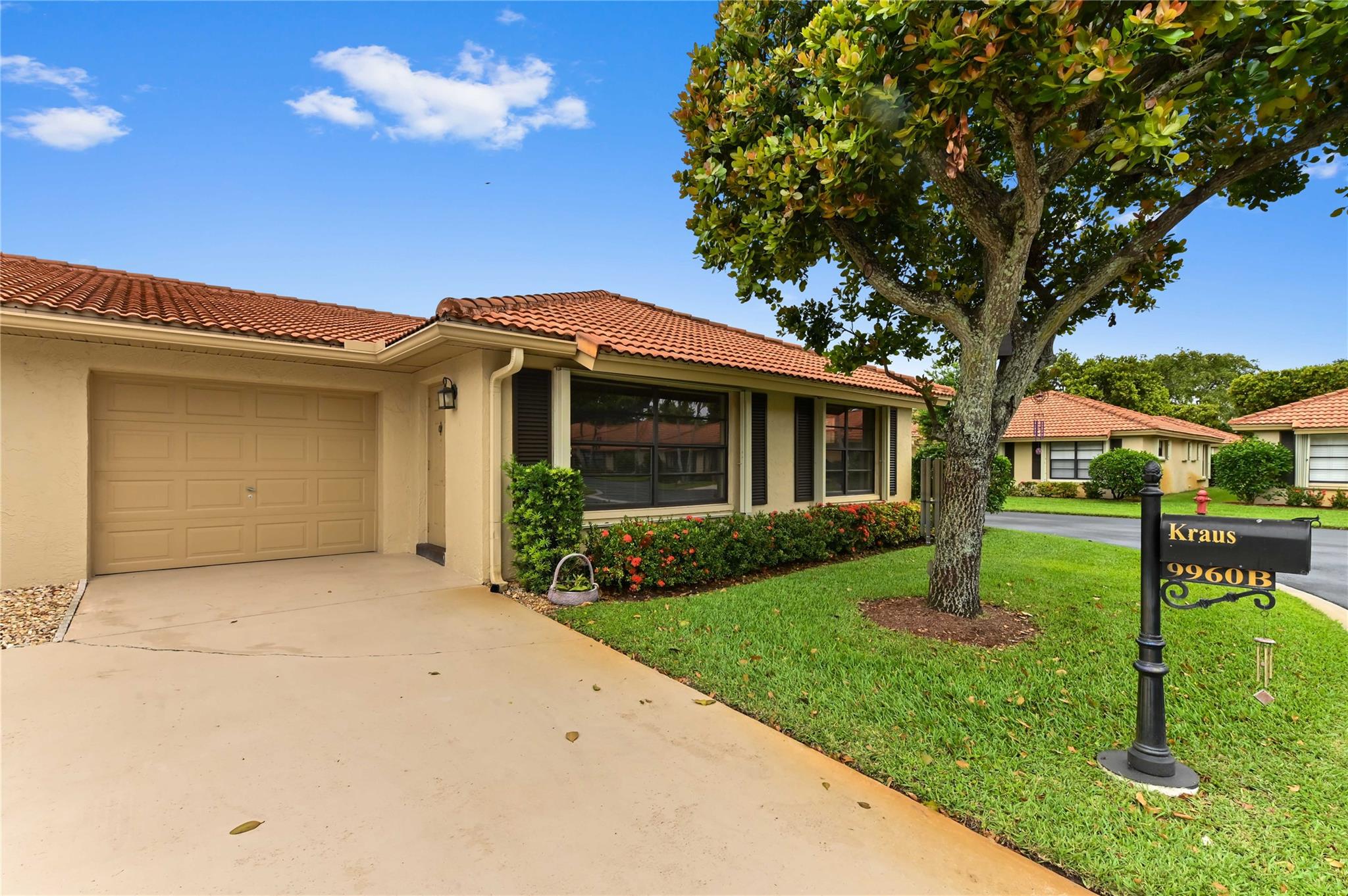 Motivated sellers!!! Bring Offers!!!  Charming 2 bed, 2 bath condo with 1-car garage in a desirable 55+ gated community. Features include a spacious living room, dining room, breakfast nook, and kitchen with ample storage and counter space.  Laminate flooring throughout. The primary bath boasts an updated Bath Fitter tub. Enjoy peace of mind with accordion shutters, a newer AC (2019), and a private paver patio. HOA includes water, sewer, cable, building insurance, and exterior maintenance. Driveways are scheduled for resurfacing. Community offers pool, clubhouse, numerous clubs/activities, and onsite management. Conveniently located near shopping and beaches.