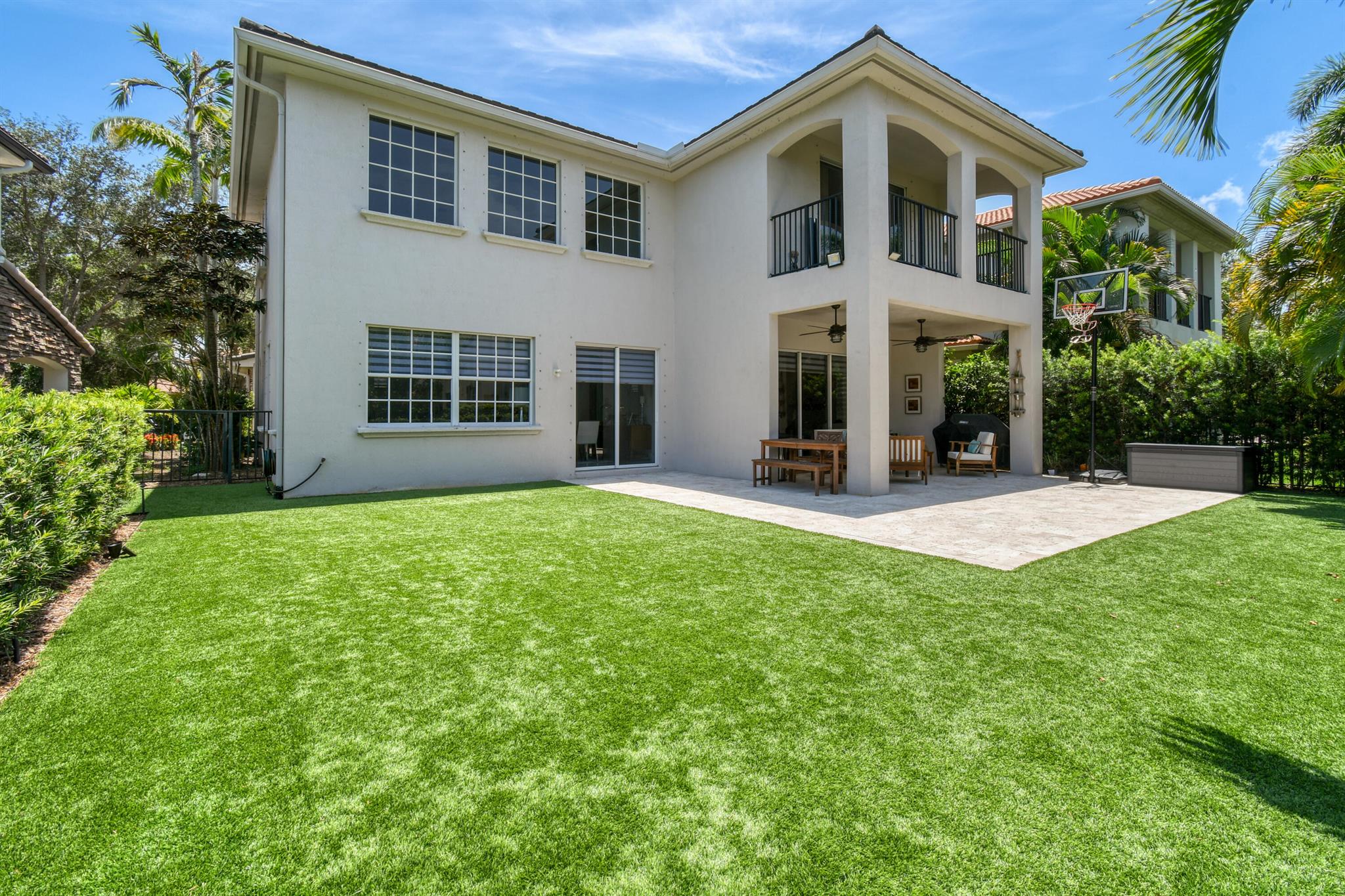 ''Absolutely Fabulous'' Modern, Contemporary, 4 Bed/3.5 Bath Home with Separate Courtyard Guest Suite + Lake Views and a Large Fenced-In Backyard. Open Modern Kitchen Includes; Refinished Cabinetry, Top Notch Appliances, Natural Granite Countertops & a Large Shelved Storage Pantry. Separate Living & Dining Rooms have Soaring 25 Foot Ceilings. Upgraded Bathrooms. Fenced-In Low Maintenance Synthetic Turf Backyard Plus a Travertine Extended Patio, Perfect for Entertaining. Tile & Luxury Laminate Floors, Whole House Water Purification Systems, Plumbed & Wired for a Home Generator. Move-In Ready. Enjoy Evergrene's Resort-Like Amenities. Minutes to the Beach, Tennis Center, Public Golf Courses, Downtown & the Airport, Triple ''A'' Rated Schools.