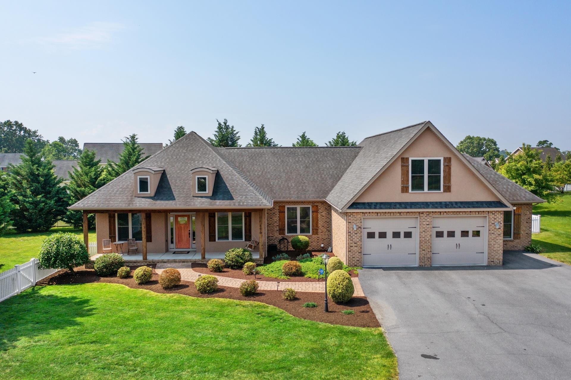 Nestled in the heart of the coveted Magnolia Ridge subdivision, this upscale home will check all of your boxes! The flowing, open floorplan allows for unsurpassed versatility: prefer the ease of 1 level living with upscale touches, including hardwood floors & granite counters? Check. Need more storage? How about stepping in from the garage to built-in cubbies with places to leave & organize all of your shoes, bags, backpacks, life? Or a massive finished room over the garage. Check or Check. Prefer it to be a bedroom with its own full bath or game room? Check & check. In fact, each of the 5 bedrooms have their own full bath! Need a home office or a 6th bedroom? Check.  Love to entertain? Covered front & back porches with a back patio. Check! Prefer individual oases?(that’s plural!) How about a private, level, fully fenced rear & side yard that is simply begging for a hot tub & pool? Or an owner’s suite with its own sitting area & a spa tub to soak away your workday? And THE KITCHEN! Just stop reading & call your agent for a tour. We are checking dreams now!  But wait, there’s more! Life throw a curve ball with a returning child or parents needing closer care? How about a studio apartment with its own entrance?!