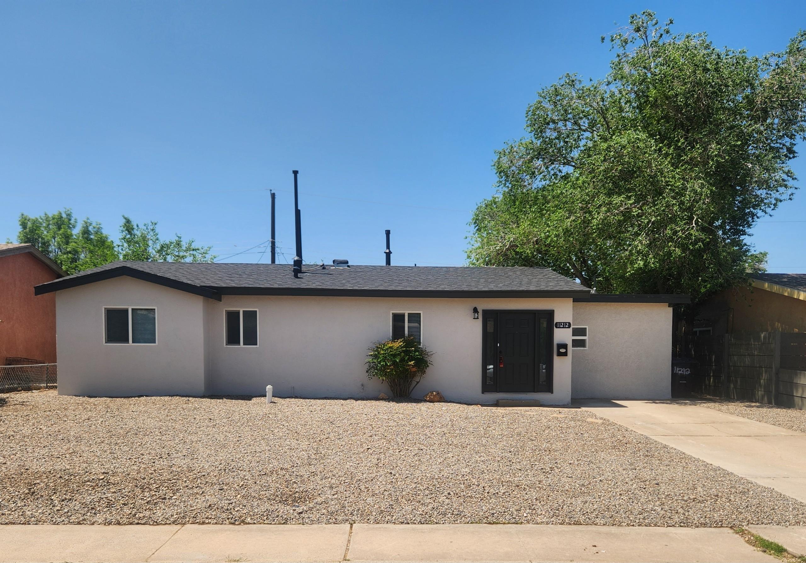 This Home Features A Large Living Areas 3 bedrooms 2 Baths, Heated Sunroom Fresh Paint (inside & out) Tile, Laminate flooring, Kitchen Cabinetry, Microwave, Smooth-top Range, Dishwasher, Disposal, Refrigerator, Water Heater, Fixtures, Bathrooms, Window Coverings, Doors, Heating& Refrigerated Air Split System And Plenty Of Storage. And Fresh Front Yard Landscaping. Close to schools and parks. This home is ready for New owners!!