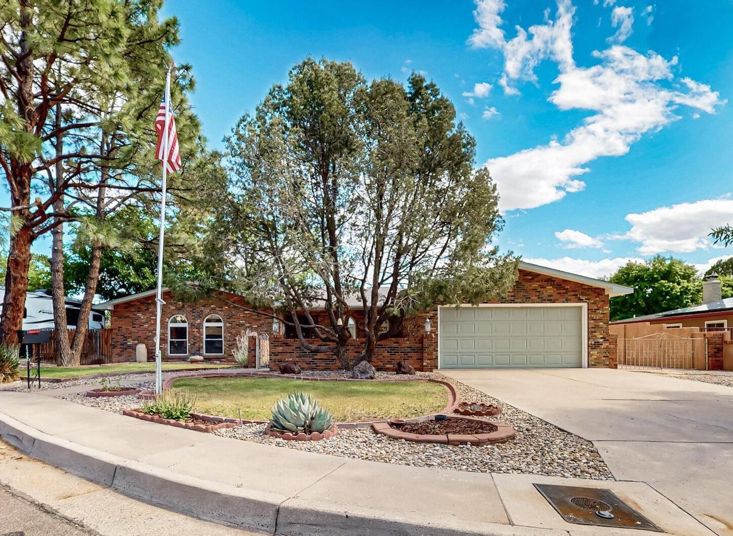 Incredible property & awesome price! Sited on a professionally landscaped .22 Acre culdesac lot, this stunning home is conveniently located in a mature neighborhood in the heart of the NE Heights. The owners of 40 years have lovingly and meticulously maintained and generously updated this classic ranch style home - with an eye to quality workmanship, functionality of purpose and charming character. From the professionally remodeled kitchen & bathrooms, to updated roof, windows, refrigerated AC, CFA gas furnace, hot water heater to the oversized covered patio with brick floors & beamed ceiling providing an additional  outdoor living space for relaxation, entertainment, & enjoyment lushly landscaped backyard oasis.   MORE....
