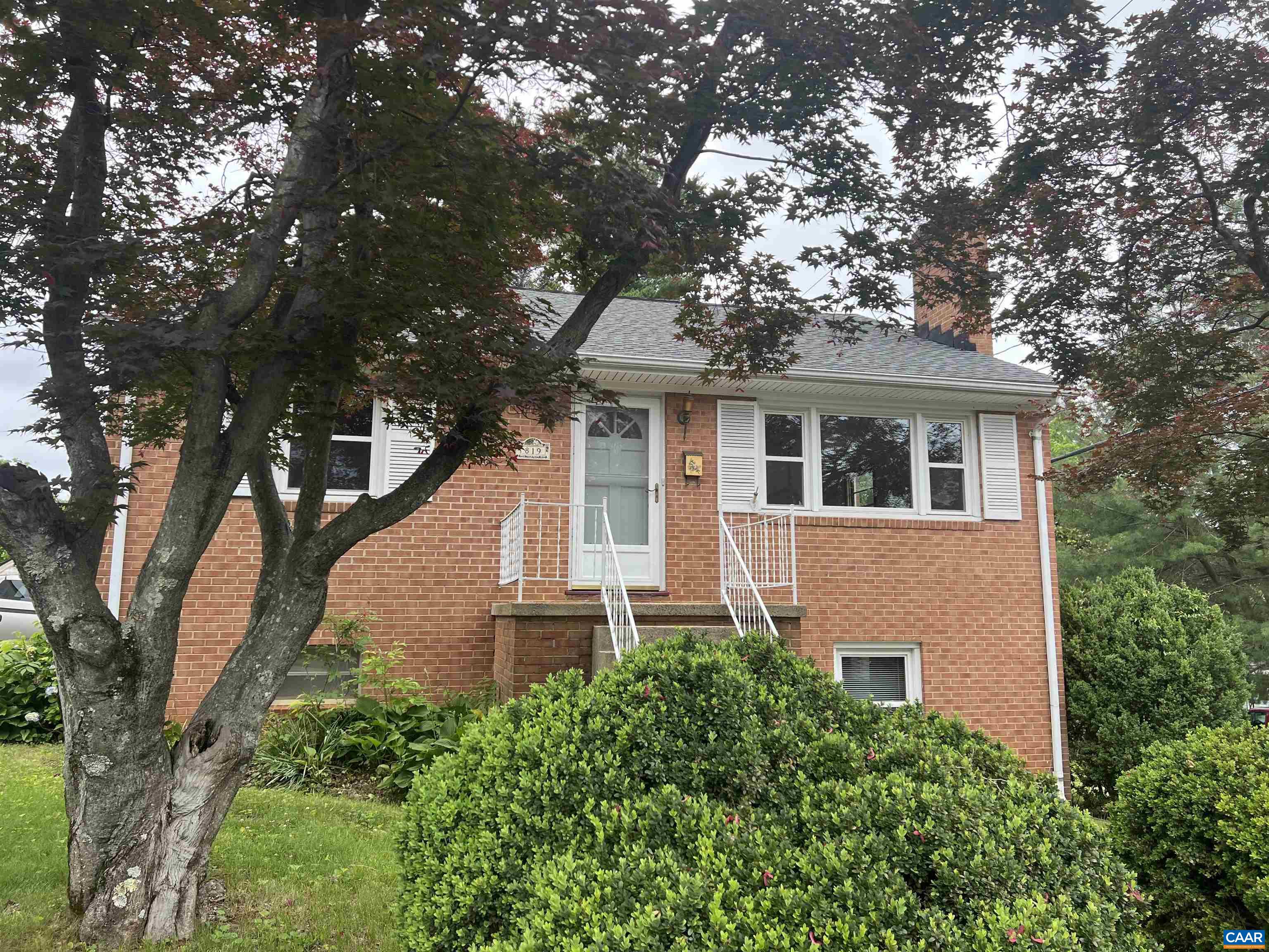 Open House 11:30-1:00 Saturday 7/19....Pristine raised ranch style home set in the heart of Belmont...A cheerful, light-filled home with beautiful hardwood floors, a full walk-out terrace level with masonry fireplace, workshop area, garage, and a nearly level back yard...Lovingly  maintained, roof replaced in 2019, replaced electrical system(new panel box inside completely new meter and service, from Dominion),  2 updated bathrooms, full attic with pull down stairs, rear side deck....Side alley gives excellent access to backyard with great opportunity to expand, play or garden...Zoned R-B