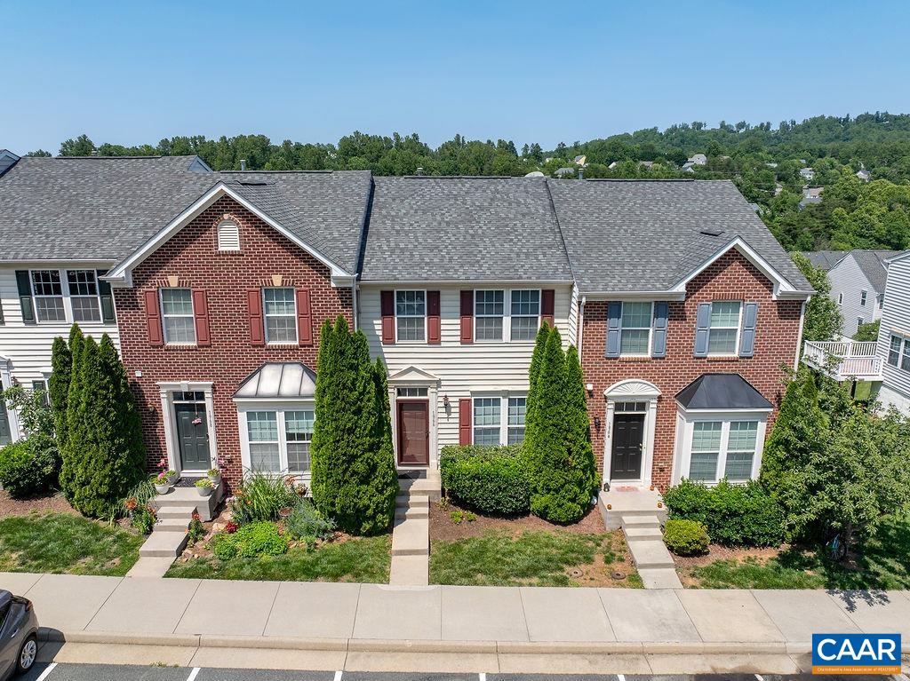 OPEN HOUSE 8/2 10am-Noon! NEW PRICE! Welcome to 1966 Asheville Drive – a bright, spacious townhome in a prime location on Pantops conveniently located near Martha Jefferson Hospital, Rt 250 and Interstate 64. This move-in-ready unit features an open main level with hardwood floors, a stylish kitchen with island seating, granite, gas ranges and a pantry. Plus plenty of space for entertaining or relaxing in the living or dining spaces or rear deck and enjoy the stunning views. Upstairs, the generous primary suite offers a large walk-in closet and a beautifully appointed bathroom with dual vanities, a soaking tub, and a separate shower. The finished basement adds even more versatility with a half bath, bonus living area, and additional storage space – ideal for a home office, gym, or guest retreat. With freshly cleaned carpet and fresh paint, this home is ready for the new owner!