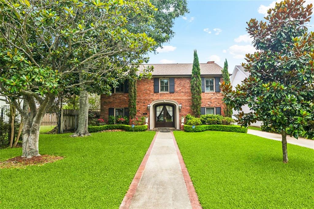 Welcome to this beautiful two-story Colonial-style home located just steps from the lake in the heart of Metairie. This spacious residence features 4 bedrooms and 2.5 bathrooms, providing ample space for comfortable family living and entertaining.  Step inside to find a classic layout with timeless details, abundant natural light, and generously sized living areas.  The well-appointed kitchen, butlers' pantry, walk-in pantry, and wet bar are perfect for preparing for guests or even using as a serving area. The formal dining room makes the ideal gathering place for meals, while the cozy living room provides a warm and inviting atmosphere.
Upstairs, all 4 bedrooms offer ample space and storage, including a spacious primary suite with a newly renovated "spa-like" en-suite bath.  Enjoy the outdoors in the nicely landscaped yard, ideal for entertaining. The property also boasts rear yard access and a detached workshop, perfect for hobbies, storage, or additional workspace.
With its prime location near the lake, this home combines elegance, functionality, and convenience all in one.