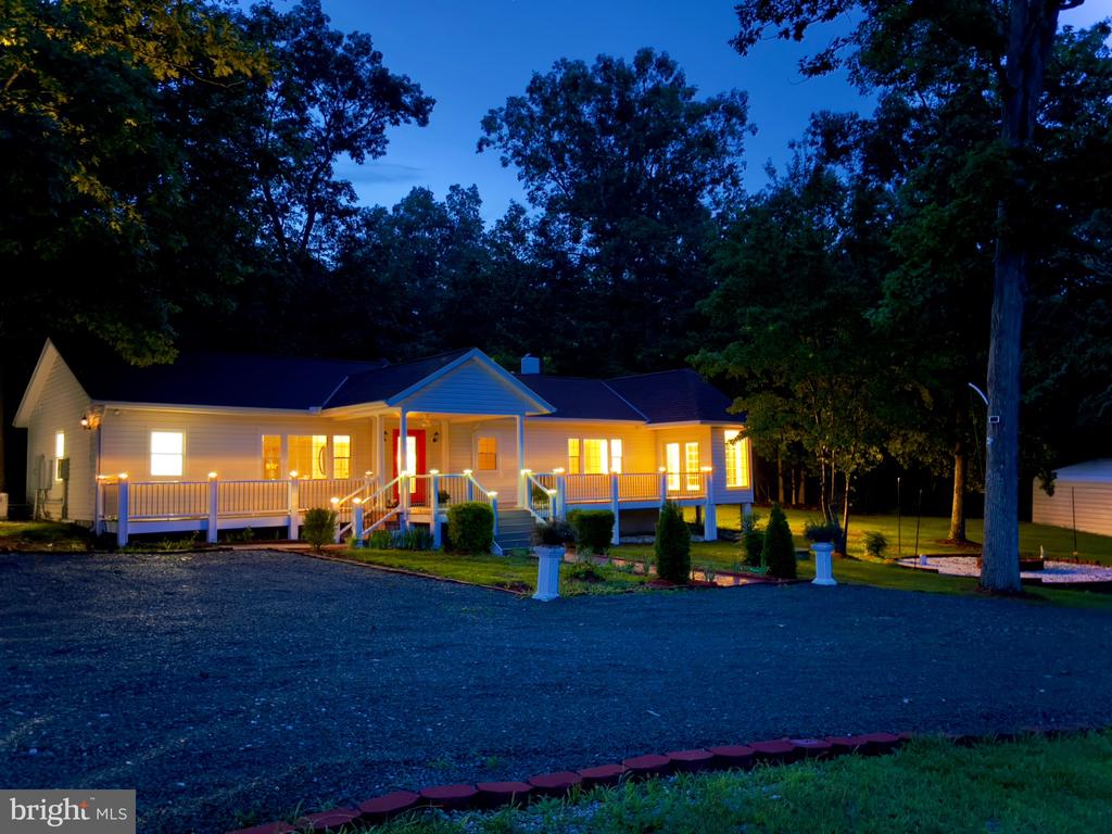 $50,000 Price Improvement + Official Square Footage Upgrade! Now reassessed at 2,819 finished sq ft (plus two enclosed sunrooms), this fully remodeled single-level retreat on 2.31 scenic acres in Keswick offers extraordinary value at $649,000””just above the county's new internal valuation of $540,000 (not yet reflected in public records). Thoughtfully redesigned for modern living, the home features 4 spacious bedrooms, 3 full baths, and a bright open layout with waterproof plank flooring, a quartz-accented fireplace, and a chef's kitchen with center island + sleek cabinetry. Two fully enclosed sunrooms, a guest suite, and a cozy bonus room with wood-burning stove provide flexibility for multigenerational living, hobbies, or working from home. Outside, enjoy a Trex front deck, outdoor fireplace + fire pit, and mature trees framing the rear patio. The two-car carport and rustic horse stable complete the countryside appeal””all just minutes from Keswick Hall and UVA. Don't miss this opportunity to own nearly 3,000 finished sq ft in one of Albemarle County's most desirable rural settings. Square footage verified by official county reassessment (July 2025); public records still reflect older figure of 2,184 sq ft. Two sunrooms ( 700+