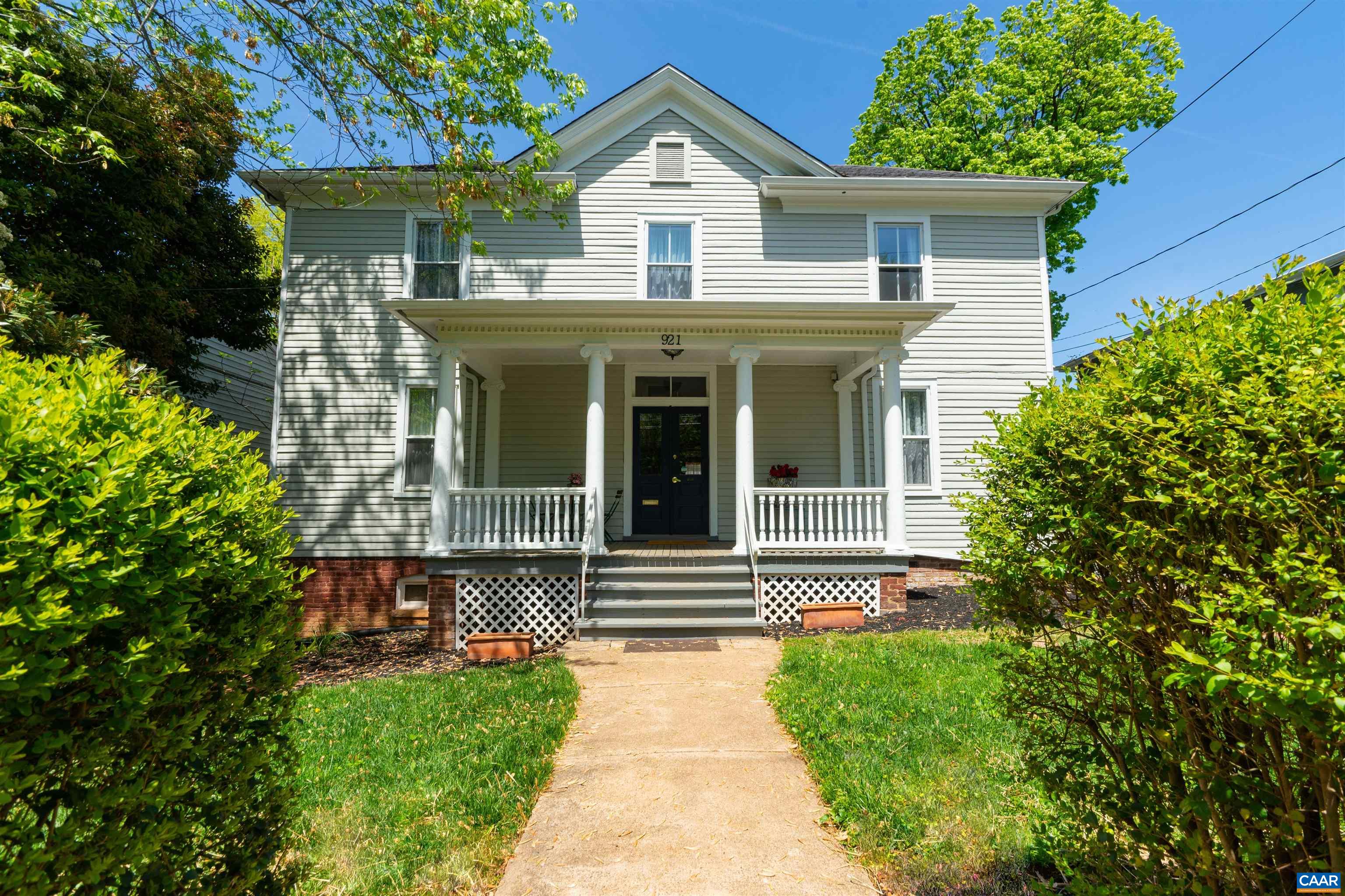 Investment or Dream Home! Discover an exceptional cash-flowing historic gem, perfectly positioned just two blocks from UVA Hospital and minutes from Main Street, Downtown Charlottesville, Forest Hills Park, and the Smith Aquatic Center. This R-C zoned property offers instant income and long-term upside. Inside, you'll find generous room sizes with high ceilings and a classic, flowing layout that highlights its great bones and abundant character. Beautiful hardwood floors and custom tile work add to its charm. Enjoy outdoor living on the large deck, perfect for grilling, or relax on the inviting front porch. Features include gas heat, dual-zoned HVAC, copper piping, and storm windows. Off-street parking provides rare convenience in this central location. Whether you're an investor seeking steady income or an owner-occupant drawn to historic charm, this must-see property is a remarkable opportunity. 3D video tour available by request.