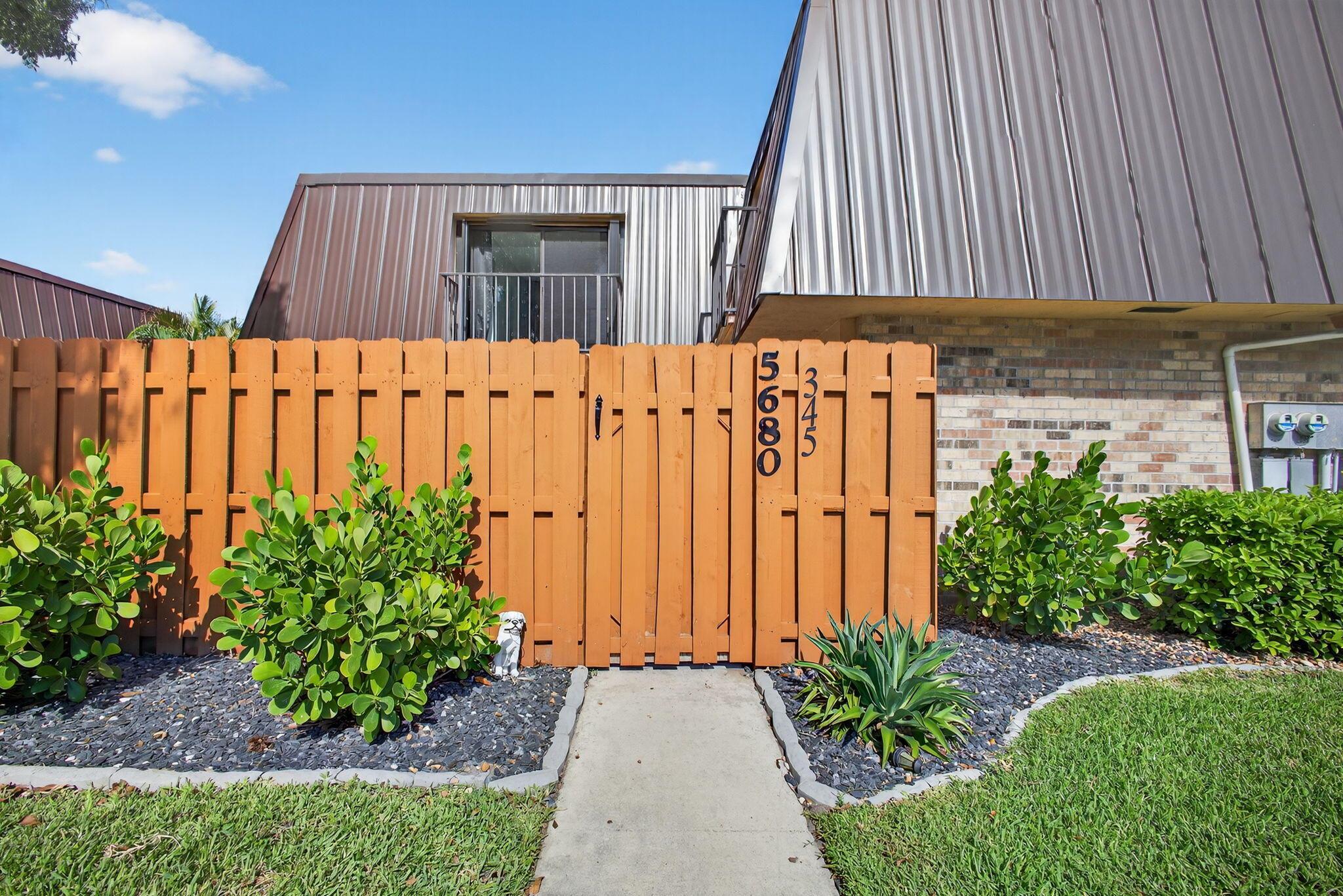 Photo 1 of home located at 5680 SE Windsong Lane 345, Stuart FL