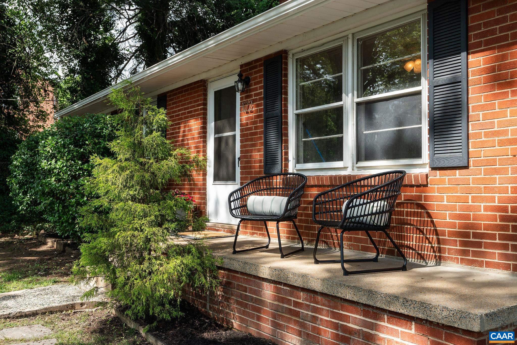 Classic brick ranch walkable to UVA on oversized corner lot. RX-3 zoning allows for maximum density making this property a great candidate for development. Renovated eat in kitchen, three bedrooms,  full bath, and living room all on the main level. Hardwood floors throughout living and bedrooms. Unfinished walkout basement has been waterproofed and is ready for you to customize the property to your needs. Fully fenced. Off street parking and carport. Invest in a growing area near University of Virginia with quick access to I64.