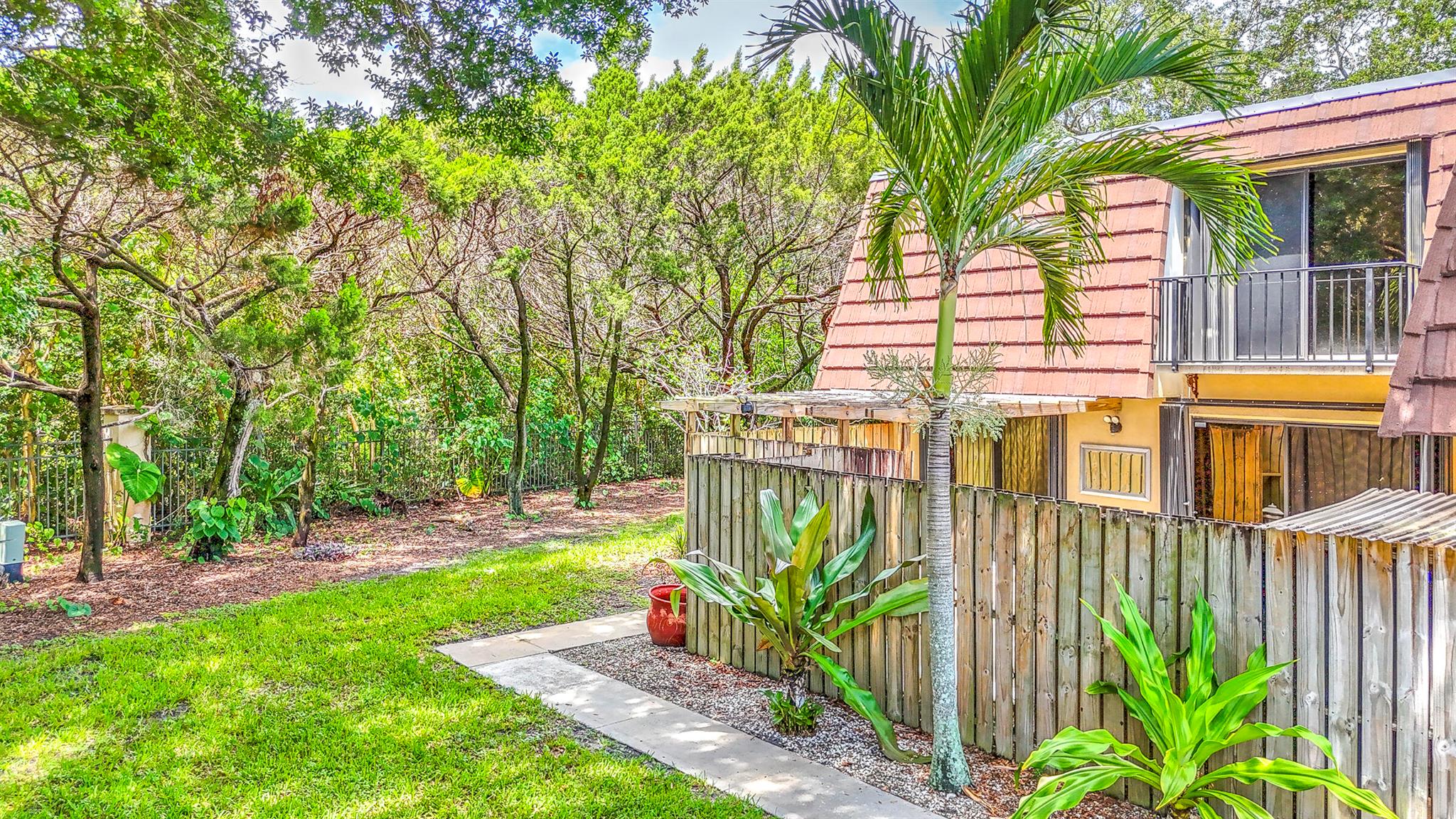 Welcome to this spacious and inviting 2-bedroom, 2.5-bathroom townhome with a versatile den, ideally situated in the heart of Palm Beach Gardens. Overlooking a tranquil preserve, this beautifully maintained residence offers both privacy and picturesque views. Accordion shutters provide peace of mind, while the light-filled, open layout creates a warm and welcoming atmosphere--perfect for everyday living and entertaining guests.The thoughtfully designed floor plan offers ample space and flexibility, allowing the new homeowner the opportunity to personalize and update to their taste. Enjoy the convenience of being centrally located near premier shopping, dining, and entertainment options, as well as top-rated schools all within walking distance.This vibrant community features exceptional amenities, including basketball and pickleball courts, a mile-long walking trail, a playground, and more, making it ideal for active lifestyles and family fun. Don't miss your chance to own this wonderful townhome in one of Palm Beach Gardens' most desirable locations!