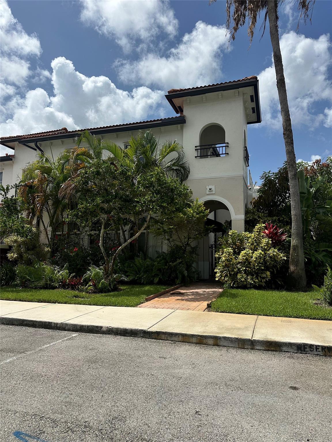 This beautiful 3/2.5 Townhome located in Lauderdale Lakes is looking for its 2nd owner. Private courtyard and 2 parking spaces in front of unit. Ample space for 2 living areas in this 1700+ square foot townhome. Enjoy BBQ or gardening in your large enclosed private courtyard in addition to a patio off a guest bedroom.