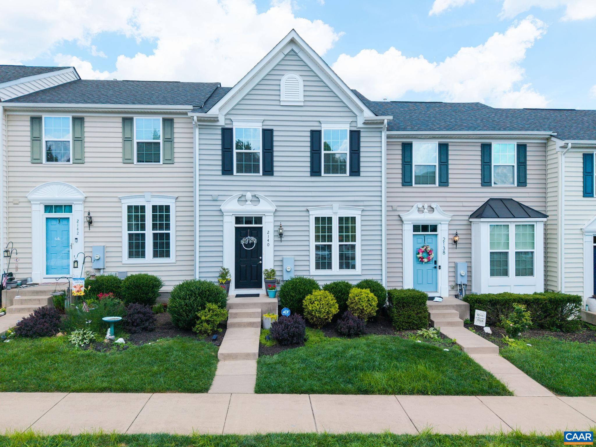 With fantastic convenience to 29N, NGIC, UVA, and Hollymead Town Center, this well-kept one-owner townhome features main-level entry with open-concept  living, kitchen and dining rooms leading out to a back deck boasting views and perfect for entertaining. Granite countertops, painted maple cabinets, hardwood flooring, and GE stainless-steel appliances round out the kitchen and main level, while the bathrooms feature cultured white marble countertops and ceramic tile flooring. On the home's upper level you'll find the primary bedroom with attached bath and generous walk-in closet, as well as two additional bedrooms, a second full bath, and conveniently located laundry. A spacious finished basement perfect for playroom, office, den, home gym or recreation room offers walk-out access to a landscaped fenced backyard with shaded patio, as well as tons of storage and three-piece rough-in plumbing for fourth bath potential. HERS energy-rated and move-in ready, with flooring updates on terrace and bedroom levels. HOA fee includes front yard landscaping, trash pickup, snow removal, and common area maintenance.