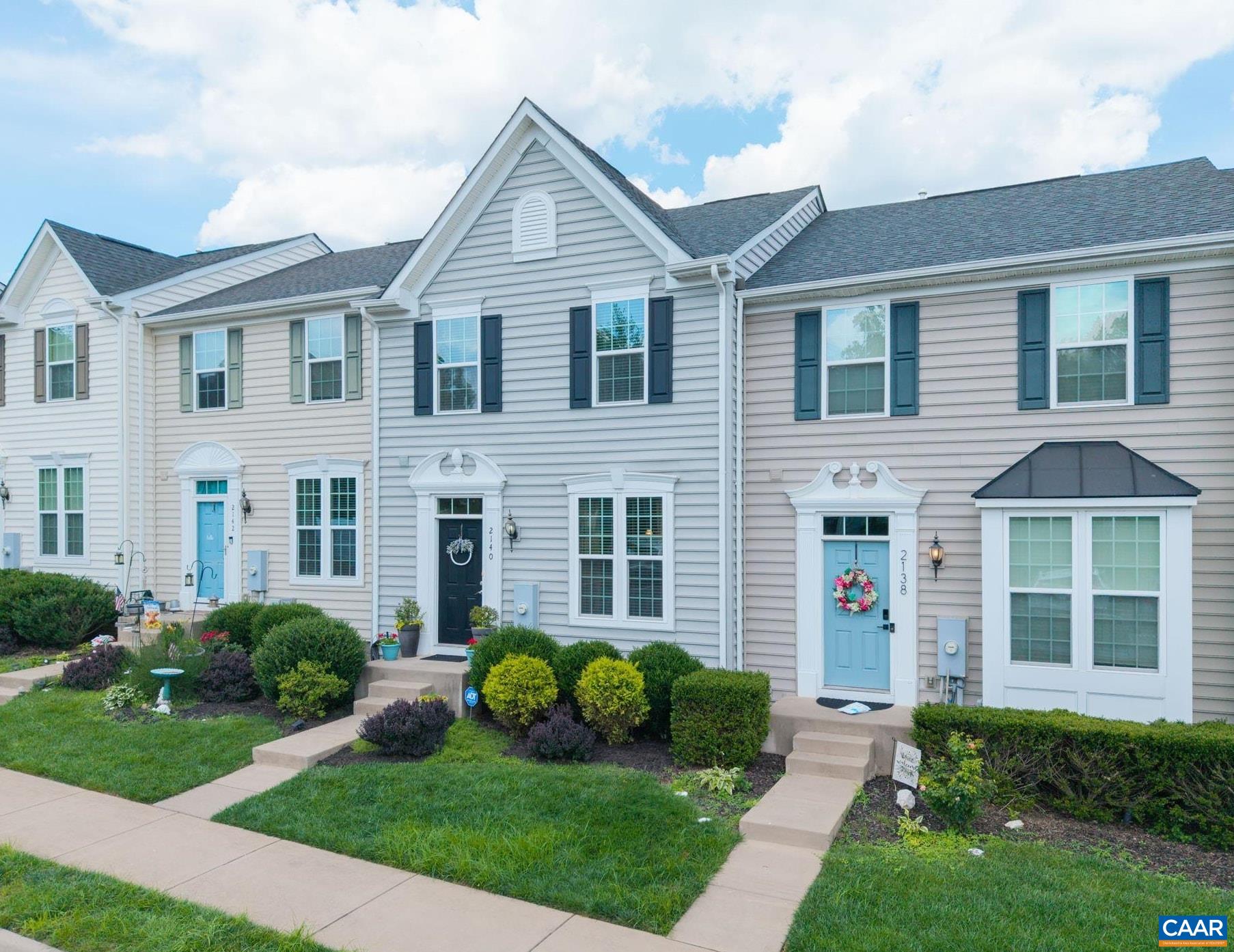With fantastic convenience to 29N, NGIC, UVA, and Hollymead Town Center, this well-kept one-owner townhome features main-level entry with open-concept  living, kitchen and dining rooms leading out to a back deck boasting views and perfect for entertaining. Granite countertops, painted maple cabinets, hardwood flooring, and GE stainless-steel appliances round out the kitchen and main level, while the bathrooms feature cultured white marble countertops and ceramic tile flooring. On the home's upper level you'll find the primary bedroom with attached bath and generous walk-in closet, as well as two additional bedrooms, a second full bath, and conveniently located laundry. A spacious finished basement perfect for playroom, office, den, home gym or recreation room offers walk-out access to a landscaped fenced backyard with shaded patio, as well as tons of storage and three-piece rough-in plumbing for fourth bath potential. HERS energy-rated and move-in ready, with flooring updates on terrace and bedroom levels. HOA fee includes front yard landscaping, trash pickup, snow removal, and common area maintenance.