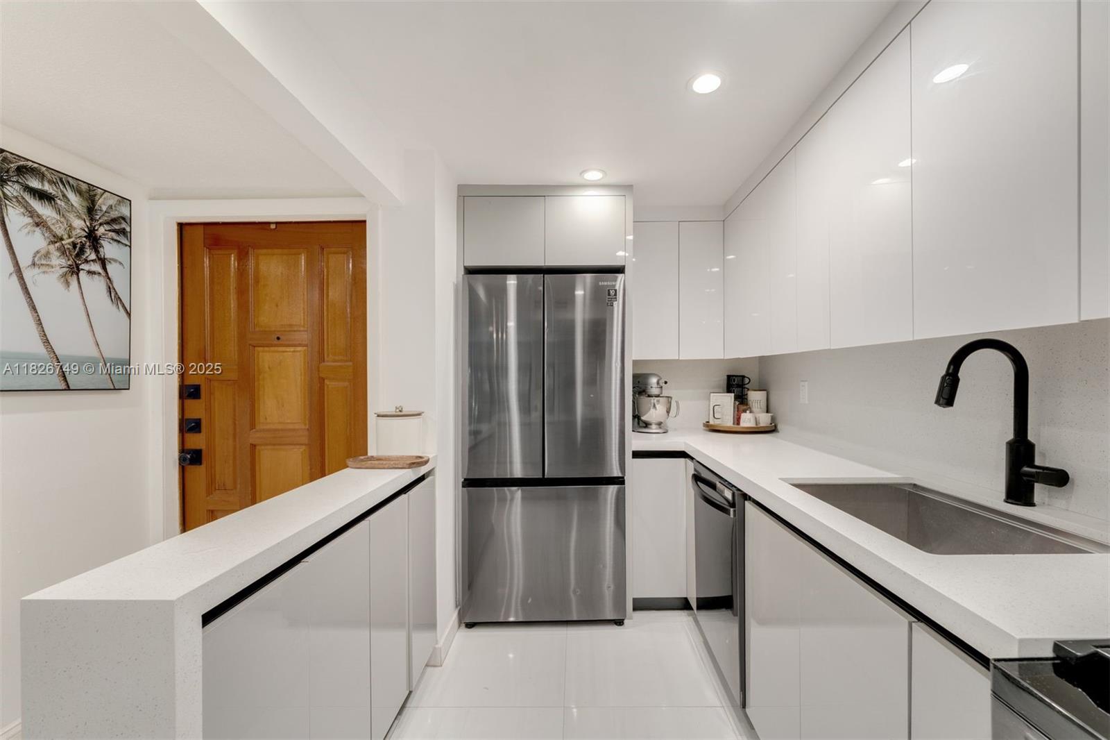 Step into this beautifully updated 2-bedroom, 2.5-bathroom townhouse, offering a perfect blend of style, comfort, and convenience. Recent upgrades include a brand-new water heater, washer/dryer combo, modern kitchen with updated appliances, new doors and doorframes, redone balcony, full impact glass throughout, and mold remediation for peace of mind. Inside, enjoy an open-concept layout filled with natural light, sleek finishes, and spacious living areas. Both bedrooms offer generous space and updated en-suite bathrooms with a modern touch. Located in a gated community with low HOA fees, just minutes from Coconut Grove's parks, shops, dining, and vibrant lifestyle.