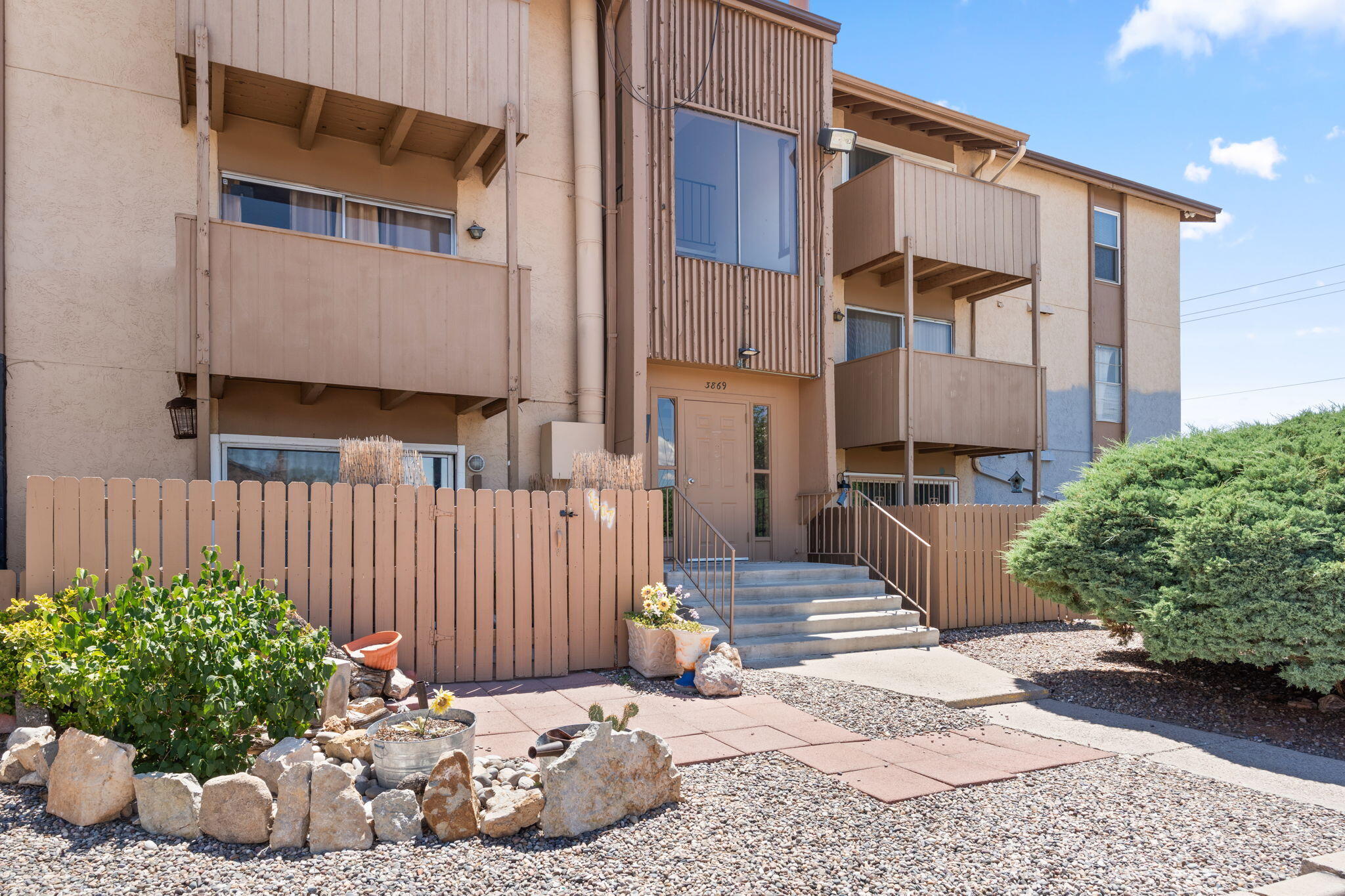 Welcome to 3869 Montgomery Blvd NE #1636--an updated 2-bedroom, 1-bath condo in a prime Albuquerque location! Enjoy brand-new flooring and fresh interior paint, giving the space a clean, modern feel. Step out onto your private balcony--perfect for morning coffee or evening relaxation. The community offers fantastic amenities, including a pool, clubhouse, and HOA-maintained grounds. Conveniently located near shopping, dining, and with easy access to I-25, this condo offers comfort and connectivity. Schedule your showing today! (Newly re-stuccoed exterior!)