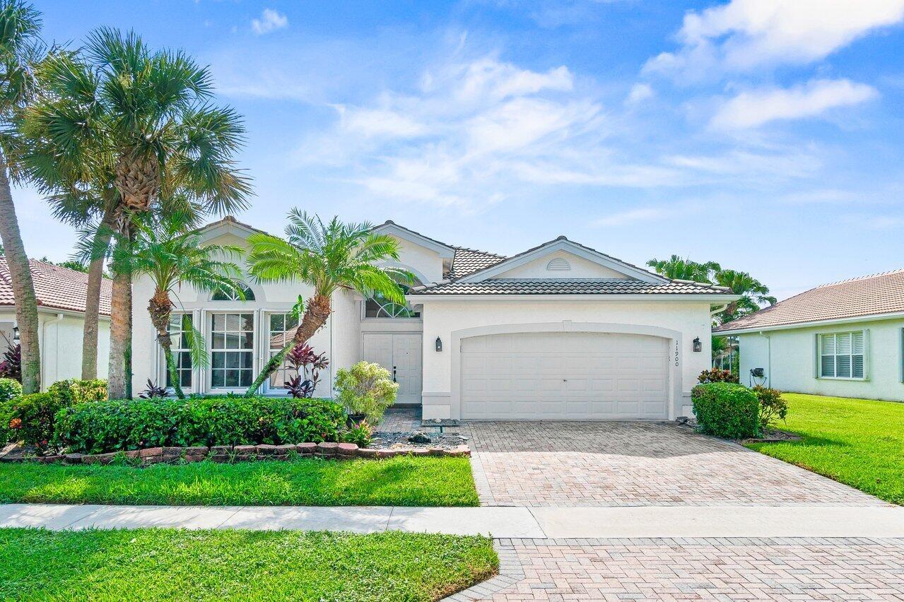 Stunning Fully Redone Home in Valencia Lakes. This Masterpiece is Like no Other in the Community. This Home has Been Redesigned with Walls Removed to Open the Entire House. There are Modern Floors Everywhere. The Stunning Kitchen Boasts Wood Cabinets, Quartz Counters and High End Stainless Steel Appliances. The Large Primary Bedroom Includes a Luxurious New Bathroom with Huge Walk In Shower and Freestanding Tub as Well as all New Cabinets and Flooring. No Expense was Spared in Creating this Remarkable Home. Step Out to Your Screened and Covered Patio For Your Private Garden and Lake Views. New Brand New Washer & Dryer. Valencia Lakes is an Incredible Active Adult Community with a Brand New Gorgeous Clubhouse that Includes a Cafe, Theater, Card Rooms & More. Do Not Miss this Opportunity!