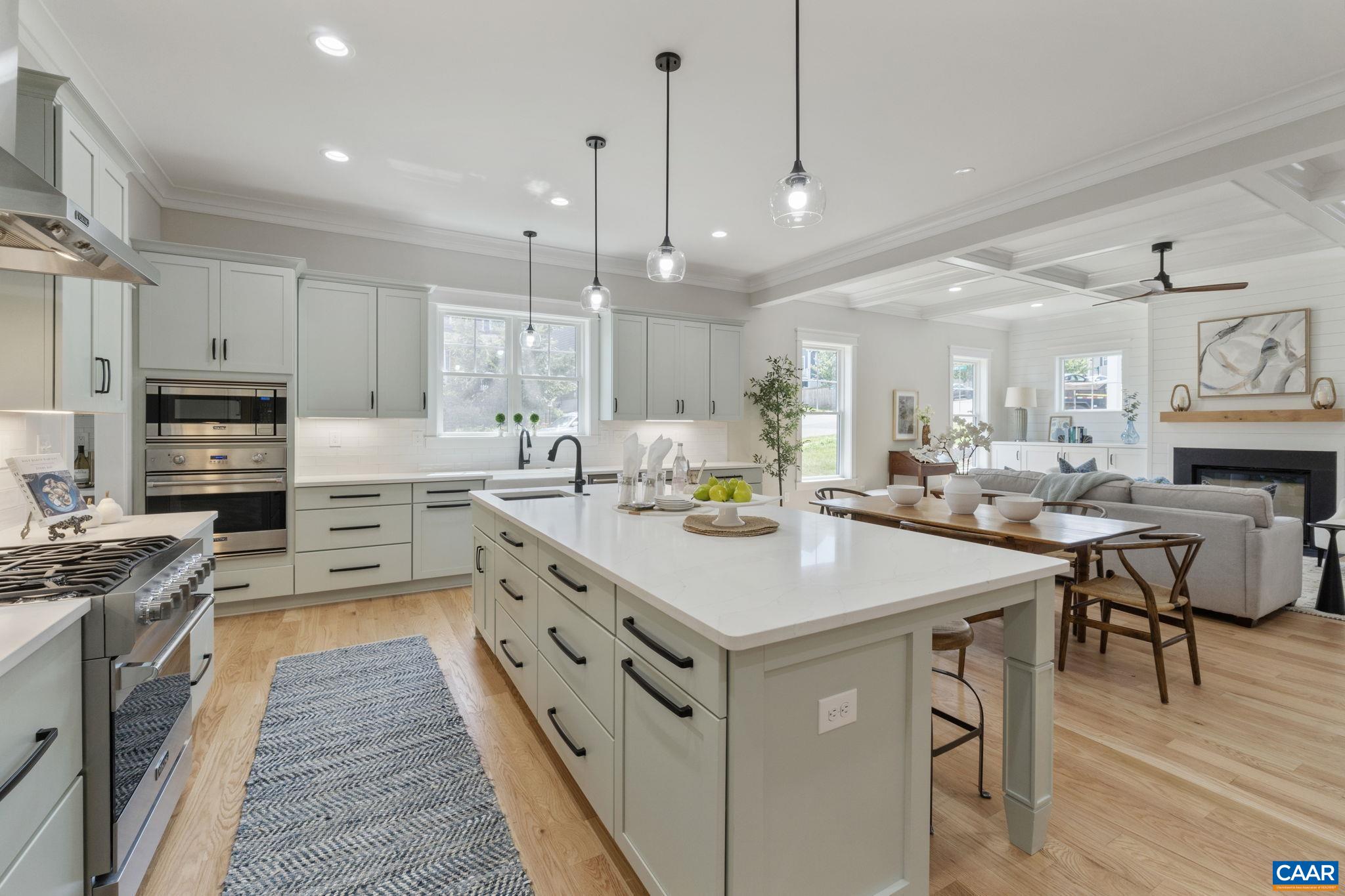OPEN HOUSE SUNDAY, August 3, 1-3pm! Enjoy park and mountain views from the 10x16 primary bedroom deck of this exquisite new construction home. Gibson Homes presents this just completed home with a cool color palate, stunning finishes and sited on a corner lot, the generous space throughout lives large. 10 ft ceilings on the 1st floor, true finished in place hardwood floors, natural gas fireplace with shiplap surround, great room coffered ceiling, Viking appliances in a chef's dream kitchen complete with a porcelain farm sink, prep sink and pot filler, custom cubbies, custom built-ins, solid core doors, wood closet shelving, custom tile work....you may have found your forever home. Along with the primary bedroom, on the 2nd floor find an en-suite bedroom and a jack and jill bedroom ensemble. A large 2nd floor laundry room completes the space. Wonderful entertaining area on the rear oversized stamped concrete patio! The detached 2 car garage with finished carriage house above can be rented or can be a perfect au pair suite, mother in-law apartment or private office. Owner/agent.