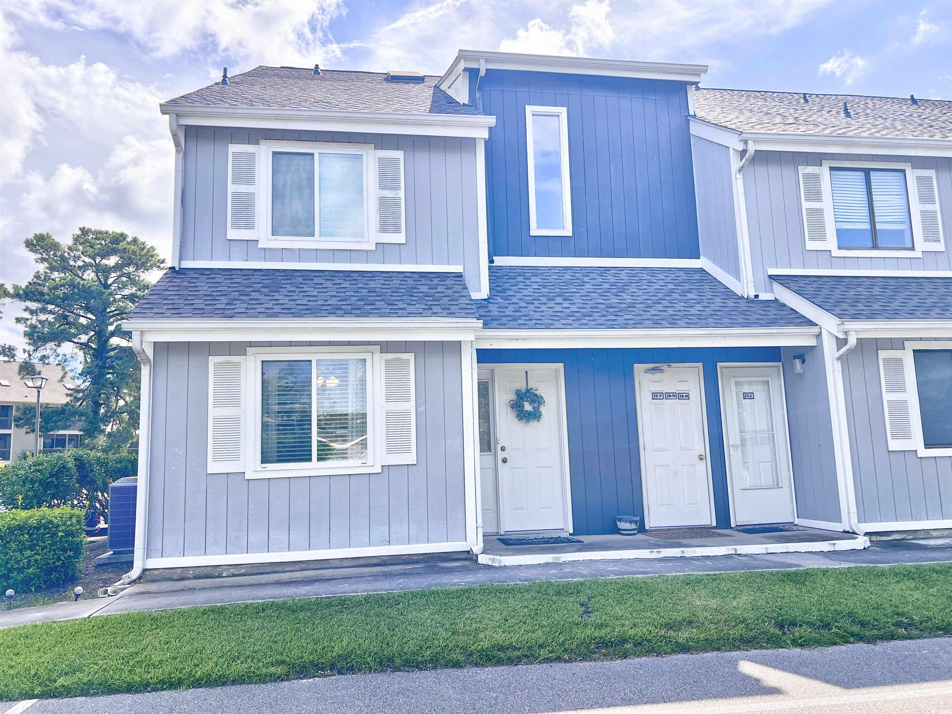 Charming Coastal Retreat in Golf Colony Resort!  Welcome to 3700 Golf Colony Lane, Unit 26O – a delightful and well-maintained 2-bedroom, 1-1/2 bathroom end-unit condo nestled in the heart of Little River. This light-filled, ground-level residence offers the perfect blend of comfort and convenience, just minutes from the beach, shopping, dining, and world-class golf.  Step inside to a bright and open living space featuring a spacious sitting area, and sliding glass doors that lead to a sunny Carolina room—ideal for morning coffee or unwinding with a good book. The kitchen boasts updated pendant lighting, modern appliances, ample cabinetry, and a breakfast bar with seating for two, perfect for casual meals or entertaining guests.  The bedroom provides a peaceful retreat with generous natural light and closet space. The bathroom is clean and functional with charming details, and there's even in-unit laundry for added convenience.  The HVAC system is brand new and the building roof has just been replaced.  Outside, enjoy a friendly community with lush landscaping, a sparkling outdoor pool, and easy access to nearby attractions like the Little River waterfront, North Myrtle Beach, and the Intracoastal Waterway.  Whether you're searching for a primary residence, a vacation getaway, or a smart investment property, this turnkey condo is fully furnished and move-in ready offering the ultimate in low-maintenance coastal living.  Don't miss your chance to own a piece of paradise in Golf Colony Resort!