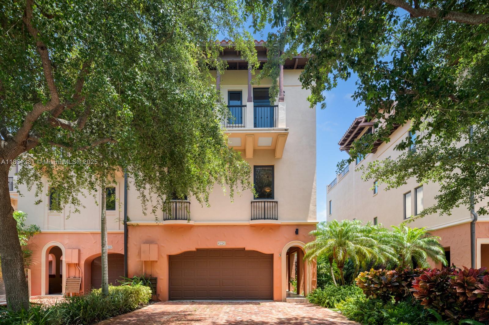 Experience waterfront luxury in this exquisite multilevel townhome in the prestigious gated enclave of Royal Harbour Yacht Club. This beautifully designed residence offers a formal dining room & gourmet kitchen w/Viking appliances, custom cabinetry & a charming breakfast banquette opening to the spacious family room. The grand primary suite features a spacious closet, elegant dressing area & spa-inspired bath w/soaking tub & glass-enclosed shower. Entertain in the expansive media room or on the spectacular rooftop patio w/sweeping views of Biscayne Bay & the Miami skyline. Highlights incl a 2-car garage, elevator to all 4 levels, impact glass & resort amenities: private beach, heated pool/spa, fitness center, tennis/pickleball courts, marina & 24-hour security. Coastal living redefined.