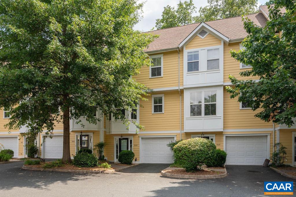 Freshly Painted throughout, New LVP Floor installed in Primary Suite and 2nd floor hallway, and a New Refrigerator is on its way to this spacious 3-bedroom, 2.1-bathroom townhome, ideally situated in a convenient City location. The home welcomes you with a bright, open-concept floor plan. The inviting living area features a gas fireplace and opens directly to an attached deck, perfect for outdoor entertaining. On the main level, you'll find beautiful hardwood floors leading to a large kitchen and an adjacent breakfast room. This property includes a one-car garage and a significant unfinished space, offering excellent storage or potential for future finishing. A perfect place to call home. Water/Sewer & Trash is covered by the HOA fees!