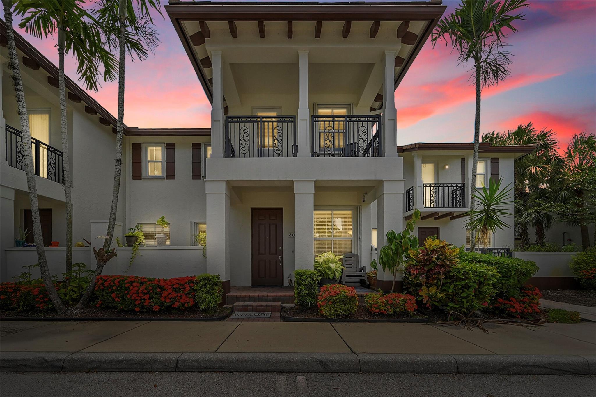 Stunning 3BR/2.5Bth townhome nestled in the sought-after gated community of Paloma Lakes, offering picturesque views of the pool from your private second-floor balcony. This beautiful residence is thoughtfully upgraded featuring hurricane accordion shutters for peace of mind, a newer A/C for energy efficiency, and a newer garage door motor. Inside, you’ll find rich laminate wood flooring on the staircase & the 2nd floor, that adds warmth & elegance. The chef's kitchen is adorned w/ gleaming granite countertops, an upgraded  backsplash, and convenient pull-out drawers in the pantry. The association includes repairs & replacement to the roof as well exterior insurance & repairs. Ideally located minutes from top-rated schools, shopping, dining, & major highways. Schedule your showing today.