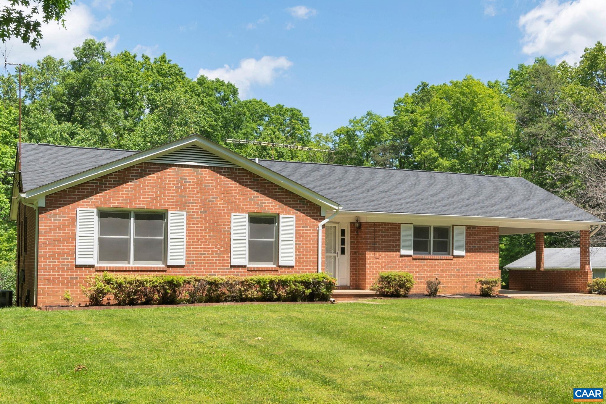 Location, Location, Location! This delightful brick rancher is set privately on a spacious 6.7-acre lot, offering both tranquility and convenience. The home features a well-designed layout with 3 bedrooms and 2 full baths on the main level, complete with beautiful hardwood floors and solid wood cabinets. The partially finished walk-out basement boasts a large family room equipped with a cozy wood stove, an additional full bath, and plenty of storage space to meet your needs. Additionally, you’ll find a detached 24x16 garage/workshop for all your projects. Notable updates include a new HVAC system installed in 2019 and a new roof added in 2017. Don’t miss out on this charming property that blends comfort with a great location!