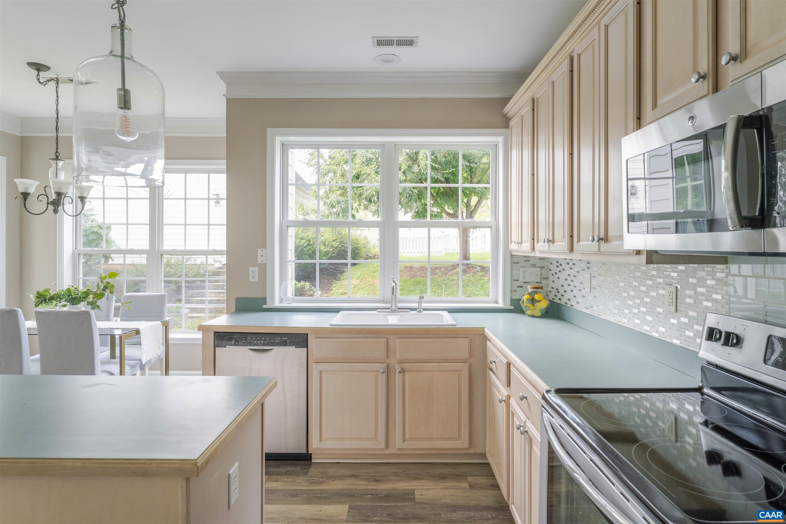 NEW PRICE, BEST VALUE IN CROZET & OPEN SUNDAY 9/28 2-4! Step into this move-in ready, standout Craftsman in the heart of Waylands Grant. Light-filled and cheerfully appointed, it offers spacious rooms with elegant details, multiple living spaces, a versatile floor plan, and a detached 2 car garage with a home office, alley access and extra parking! Walkable to Downtown Crozet & Old Trail amenities, nature trails, and top-tier schools, this home pairs an idyllic lifestyle with a smart financial upside. Get ready to make a confident move!