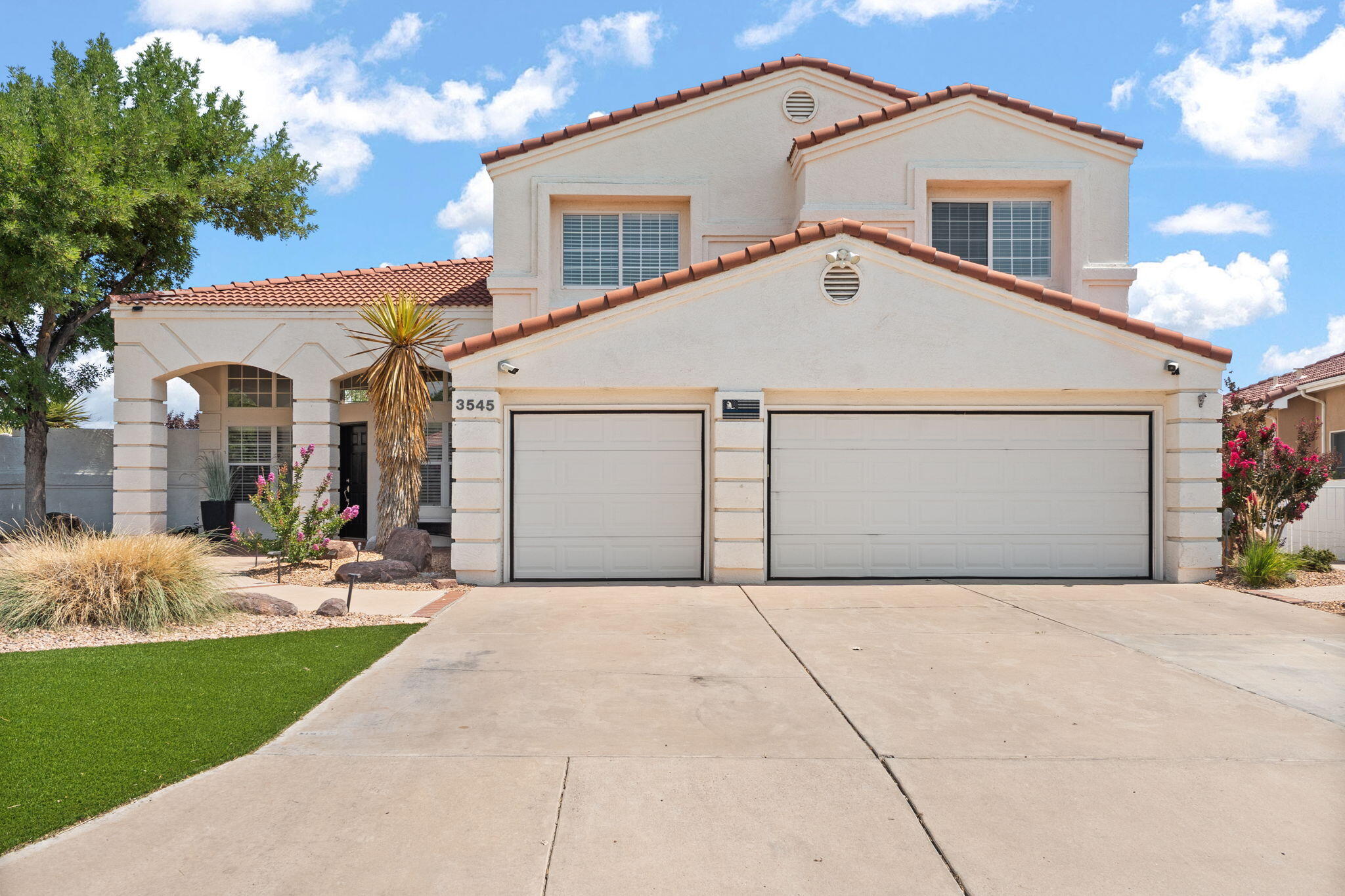 Immaculate and spacious 2-story home in Rio Rancho with beautifully landscaped front and back yards! Enjoy stunning views of the Sandia Mountains from the backyard!  Downstairs features 2 living areas, formal dining, kitchen, breakfast nook, an office (or optional 4th bedroom), and 3/4 guest bathroom. Upstairs offers a spacious loft, 3 bedrooms and 2 full baths, including a large primary suite with walk-in closet, two-way gas fireplace, jacuzzi tub, shower, and private covered patio.  There is protected open space or a future golf course to the north of the property. Two refrigerated AC units keep the home cool. Inspections and repairs are already complete--move-in ready!