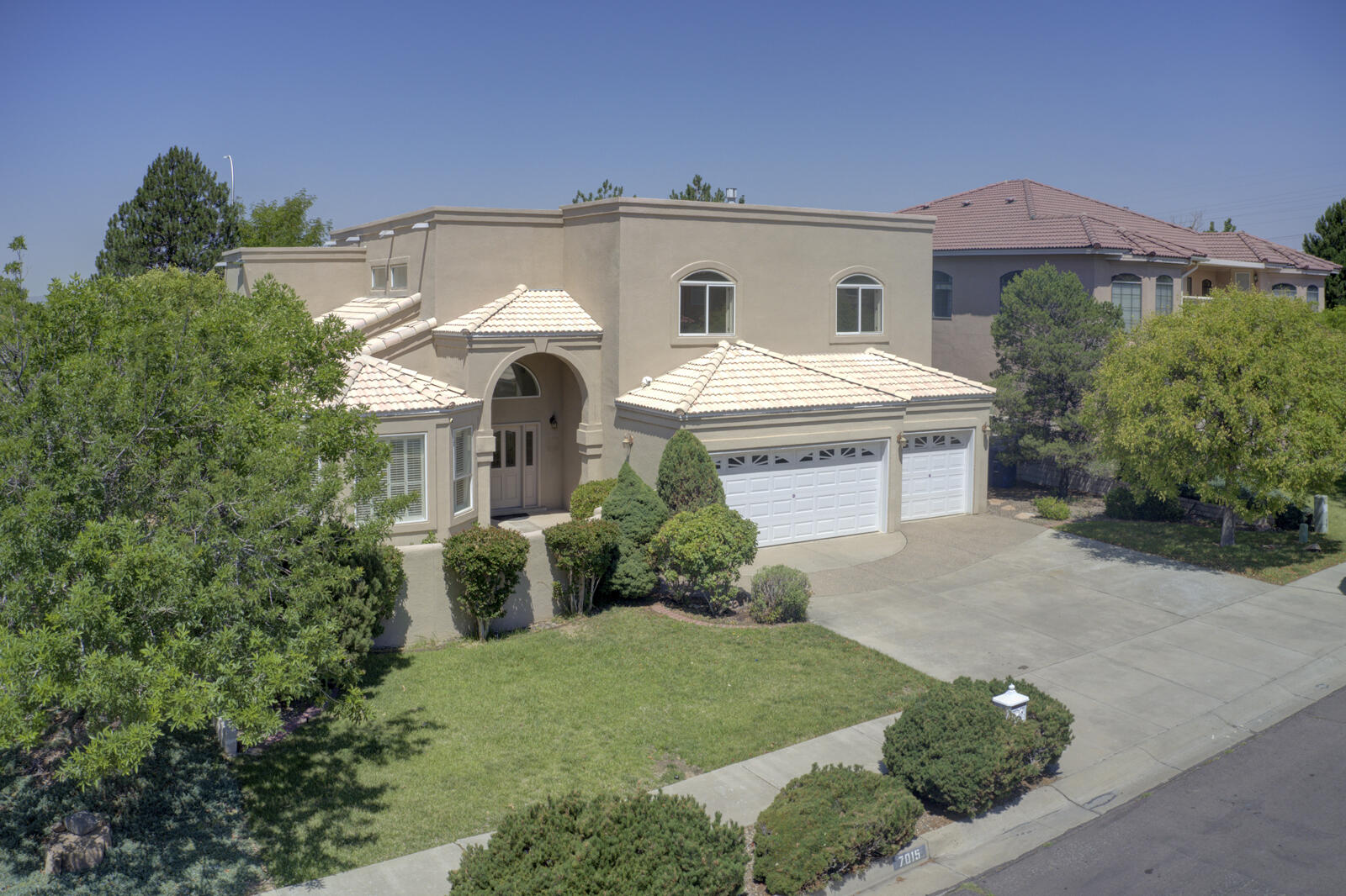 OWNED SOLAR! Discover the Possibilities in The Estates at Tanoan! This spacious 4-bedroom + Study, 3-bath beauty (with one bedroom and full bath conveniently located on the main floor) offers room to live, work, and relax in style. You'll love the flexibility of two living areas, a formal dining room, cozy breakfast nook, private study, and even a hidden bonus room off the primary suite bath--ideal for a gym, office, or extra closet space. A charming front courtyard welcomes you home, while energy-saving SOLAR panels & in-floor radiant heat add comfort & efficiency. With just a bit of paint & your choice of new flooring, this gem transforms into your dream home--located in a prestigious community within the highly sought-after La Cueva school district.