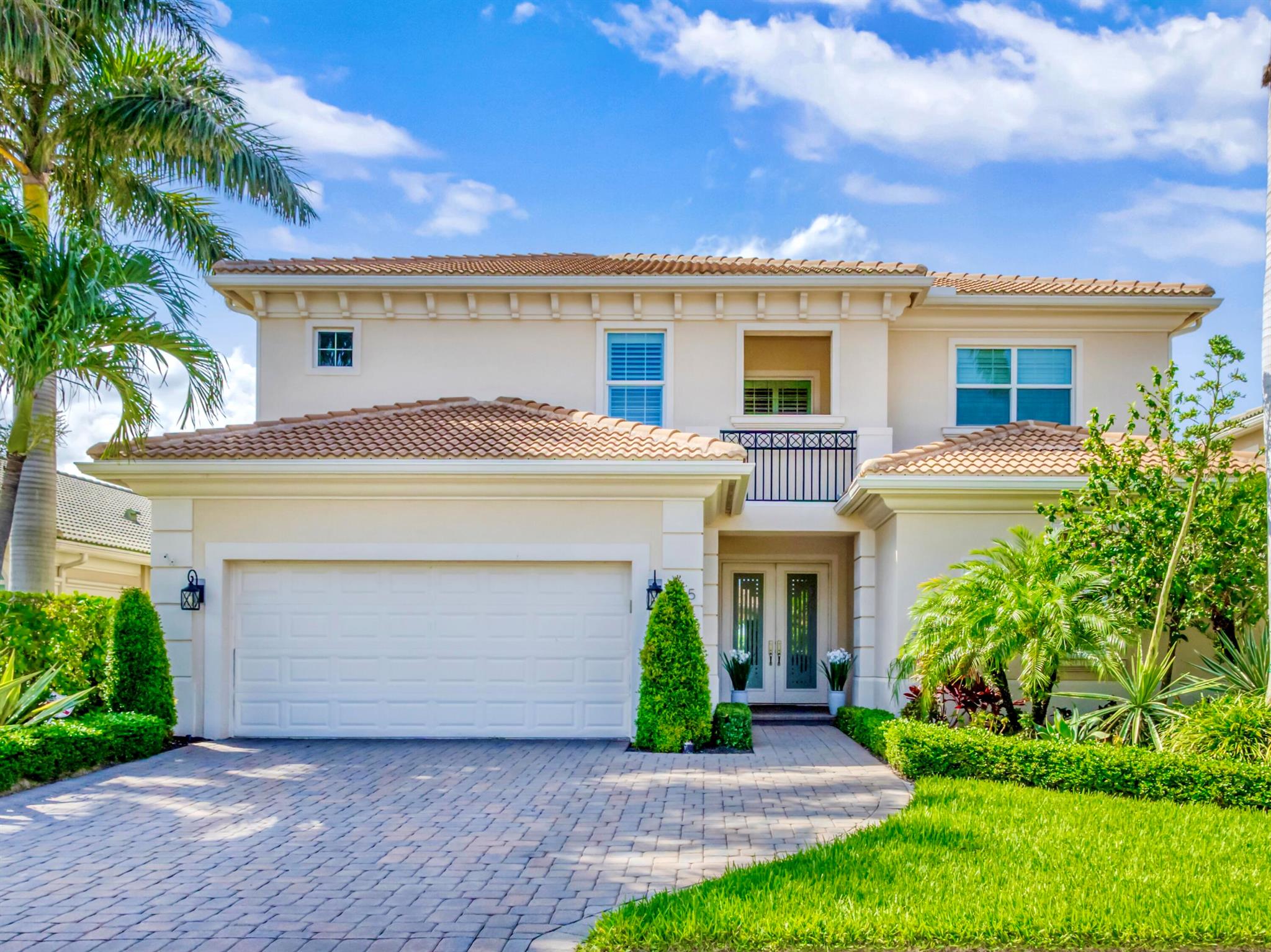Elegant Golf Course Estate with Immediate Full Golf Membership! Welcome to your serene sanctuary in one of Jupiter County Club's most sought-after, quiet sections. This stunning 4-bedroom, 3.5-bath golf course view home is a rare opportunity--offering an immediate full golf membership in one of the area's premier golf and sport communities.Thoughtfully designed for both comfort and entertaining, this home is an entertainer's delight, featuring an open-concept layout anchored by a grand great room and an expansive island where family and friends naturally gather. Crown molding throughout adds a refined touch, while the first-floor primary suite offers peaceful privacy. A separate in-law/guest en-suite bedroom bathroom on the main level ensures welcoming accommodations for visitors. With impact windows, hurricane impact glass and a full house generator, this home is well covered for all weather events.

Upstairs, discover a bonus loft and charming reading nook, perfect for added versatility. Additional features include an oversized air conditioned garage with ample space for multiple cars and a golf cart which is a must have for the golf lifestyle.
The outdoor living space is nothing short of spectacular, your own private retreat with a saltwater pool and spa, fully equipped summer kitchen, and unobstructed views of the pristine golf course. Whether you're hosting a sunset dinner or enjoying a quiet morning coffee, the tranquil setting delivers resort-style living.

This exceptional property combines relaxed luxury with everyday practicality in a vibrant community known for its world-class golf, tennis, fitness, and social amenities all just minutes from Jupiter's beautiful beaches, fine dining, and shopping.