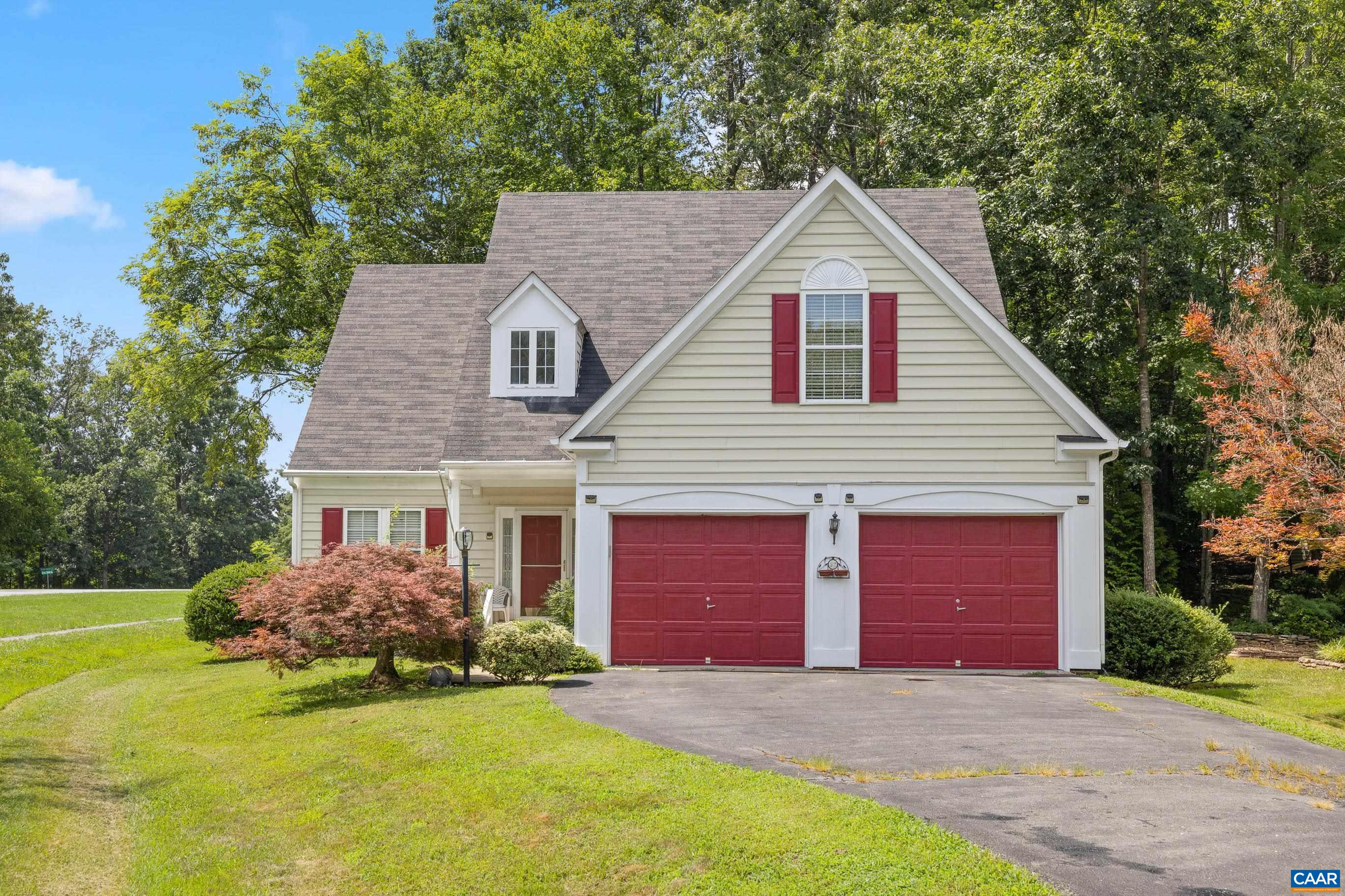 New price & motivated sellers! Charming Home in Sought-After Forest Lakes: Welcome to 2040 Whispering Woods, a spacious and light-filled home perfectly situated in the coveted Forest Lakes community. This inviting property features a soaring ceiling in the living room, convenient first-floor primary suite with attached bath, and three additional generously sized bedrooms upstairs offering flexibility and room to grow. Backing to a community-owned wooded area, the home offers a peaceful backdrop, while still being just a short stroll from the lake and the North pool with its fun-filled water slide. The home is ideal for buyers looking to personalize with their own design touches. The thoughtful floor plan provides a wonderful sense of space and flow. Recent updates include an updated HVAC system (2021), new water heater (2023), and in 2025: Freshly painted garage floor, exterior trim replacement, new crawlspace insulation, and top-quality foundation work by JES. Living in Forest Lakes means enjoying an unbeatable lifestyle with walking trails, multiple pools, soccer fields, fitness center, basketball, tennis & pickleball courts, community gardens, and more — all just steps away!