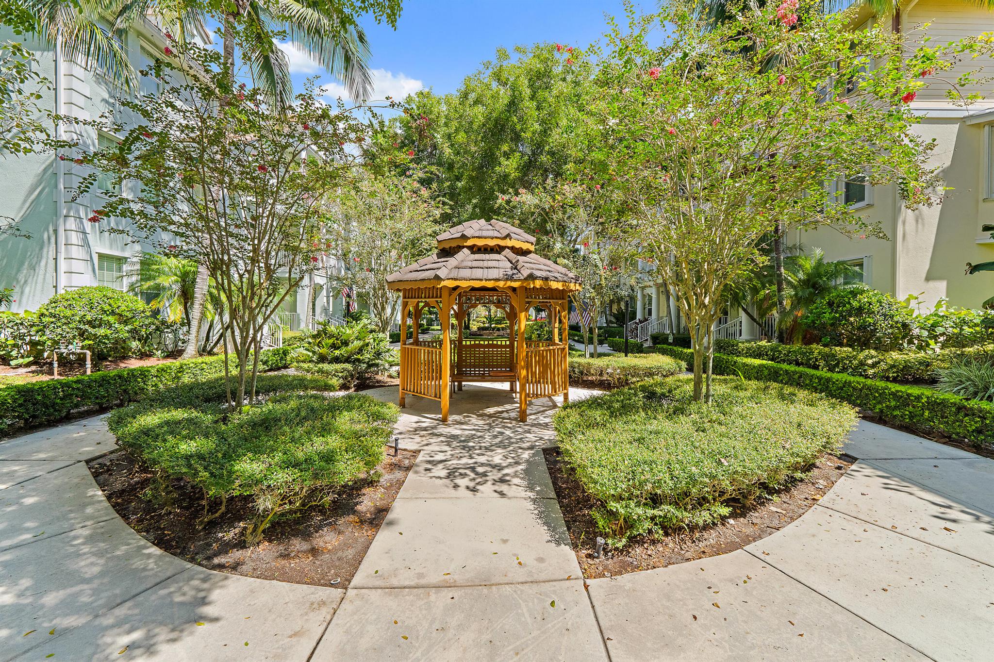 Located in highly sought-after Antigua at Abacoa, this three-story town home offers nearly 2,000 sq ft of living space and a versatile floor plan designed for modern living. With 3 bedroom s, 2 full baths, 2 half baths, and a 2-car garage, this home also features a driveway that easily accommodates two additional vehicles--rare for town home living.The first floor includes a flexible bonus room ideal for a home office, playroom, or media space, complete with a convenient half bath. On the main (second) level, you'll find an open-concept layout with the kitchen, dining area, and living room all flowing together--perfect for entertaining. The kitchen features white cabinetry, corion countertops, and a breakfast bar, while the second floor is finished with stylish vinyl plank flooring. Upstairs, all three bedrooms are located on the third level, including a spacious primary suite and two full baths.

Additional highlights include small balconies on both the second and third floors, bringing in natural light and a touch of outdoor charm, and just outside the front door, you'll find a serene gazebo and beautifully landscaped green space&#x14;ideal for walking your dog, letting kids play, or simply relaxing in nature.

Located within walking distance to Downtown Abacoa and Roger Dean Stadium, this vibrant area offers an array of restaurants, shops, mini golf, and community events like concerts and food truck nights. Just minutes from beaches, golf, and everything Jupiter has to offer.