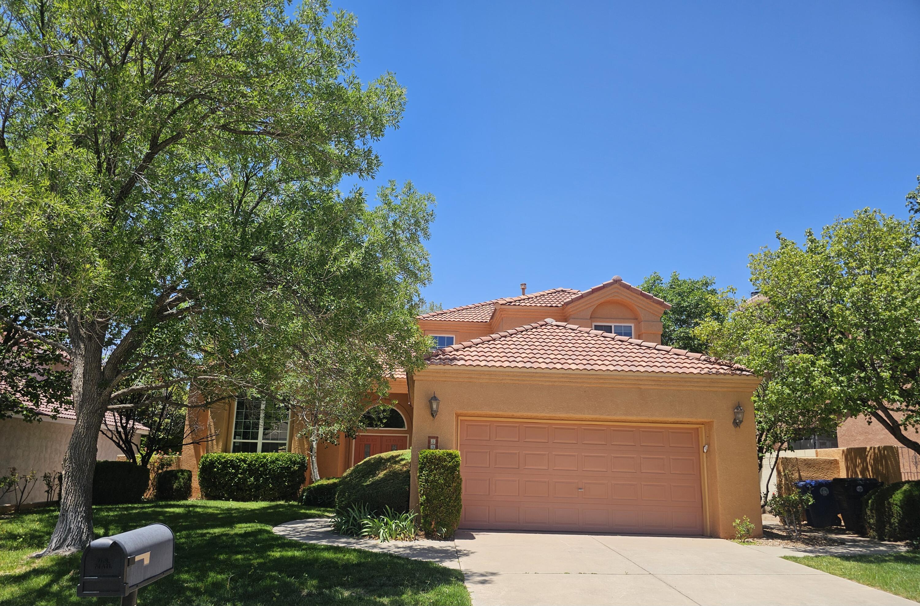 This spacious treasure is tucked off of Spain and offers room for everyone to spread out. Vaulted ceilings and sun-filled windows create a bright, airy vibe. A main-level bedroom with a 3/4 bath provides ideal accessibility and is perfect for multigenerational living.  Additional features include new paint, new carpet, new appliances, two living areas, an eat-in kitchen and formal dining, and a patio off of the primary suite. Call for your private showing!