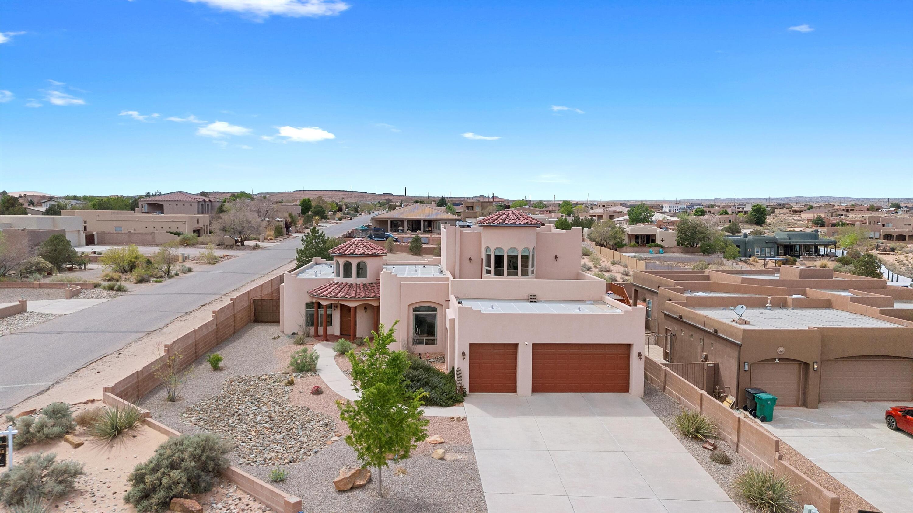 Welcome home to this fully custom home in Rio Rancho on a 1/2-acre corner lot with RV access and views of the beautiful Sandia Mountains. This home offers custom details large chefs' kitchen for entertaining, formal dining room, 2 great rooms. Extra-large primary suite on main level with custom spa like bath. 1 room on main level with full bath, 2 large rooms upstairs and jack n jill bath. Beautiful loft upstairs with deck off loft for VIEWS of the Sandia's. New carpet, tile throughout. Custom bathrooms, Pool, hot tub, fireplace in back yard for a private retreat. Home is close to hospital's, parks, shopping, freeway access, RailRunner for a quick trip to Santa Fe and restaurants. Make an appointment today.