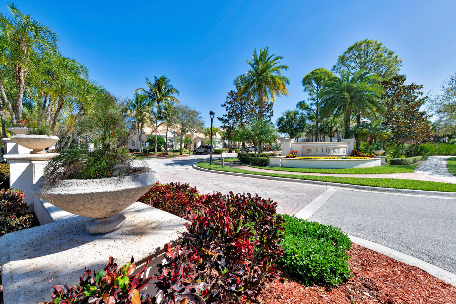 Light and bright second floor condo with southern exposure and two split bedroom suite layout. Building stairs take you up to an open air entrance to the condo. A foyer welcomes you to an open floor plan with comfortable living & dining areas along with a den or workspace. An inviting kitchen with a walk-in pantry and separate laundry area with side by side full size washer and dryer complement the living configuration. The two bedroom suites are on opposite sides for full privacy. The condo is located next to the gated community pool, gym, playground, putting green, volleyball court, picnic area and car wash. There is also ample guest parking and access to multiple area offerings such as restaurants, shopping, entertainment, various sports and beaches to enjoy the Florida lifestyle.