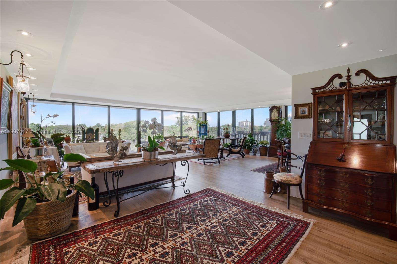 Stunning views is an understatement! You must come see this amazing unit overlooking the prestigious Granada Golf Course. Over 3,200 sq. ft. of totally and completely updated unit including kitchen, baths, flooring, impact windows and door, plus an oversized wrap around balcony.  Primary suite includes his/her bath, and walk-in closets.  Building has completed the 40-year certification, with no special assessments pending.  Twelve units in total, only one per floor.  There is no other building like this in Coral Gables. Walk to the Mile for shopping, dining, and entertainment.  A must see! Call for your private tour today.